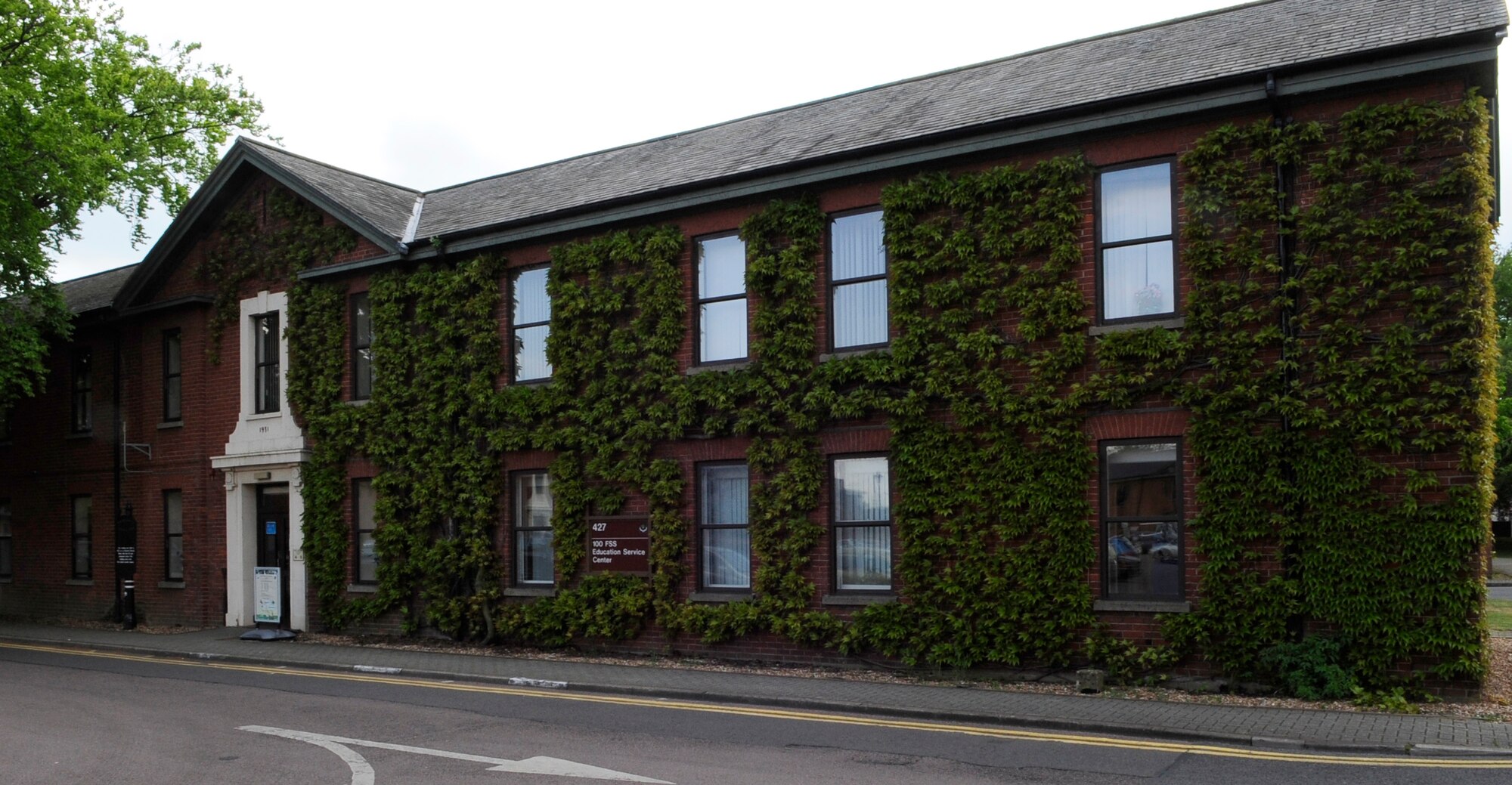 RAF MILDENHALL, England – Building 427, the Base Education Center, is one of four services buildings in the base’s historic Washington Square.  The services will synchronize their hours June 1.  (U.S. Air Force photo/Staff Sgt. Christopher L. Ingersoll)