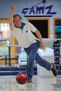 Senior Master Sgt. (ret) Dan Jones set a house record for the Randolph bowling center with a three game average of 856 on April 19. On the way to this record Jones bowled 23 consecutive strikes which included one perfect game. (U.S. Air Force photo/Steve Thurow)