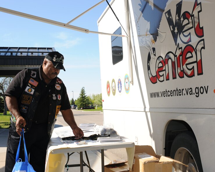 Leonard Scott, an Air Force retiree of 23 years, looks at information offered by the Veterans Center May 15, Grand Forks Air Force Base, N.D. Mr. Scott attended the Retiree Appreciation Day that was held to support Air Force retirees. (U.S. Air Force photo by Airman 1st Class Amber Price)