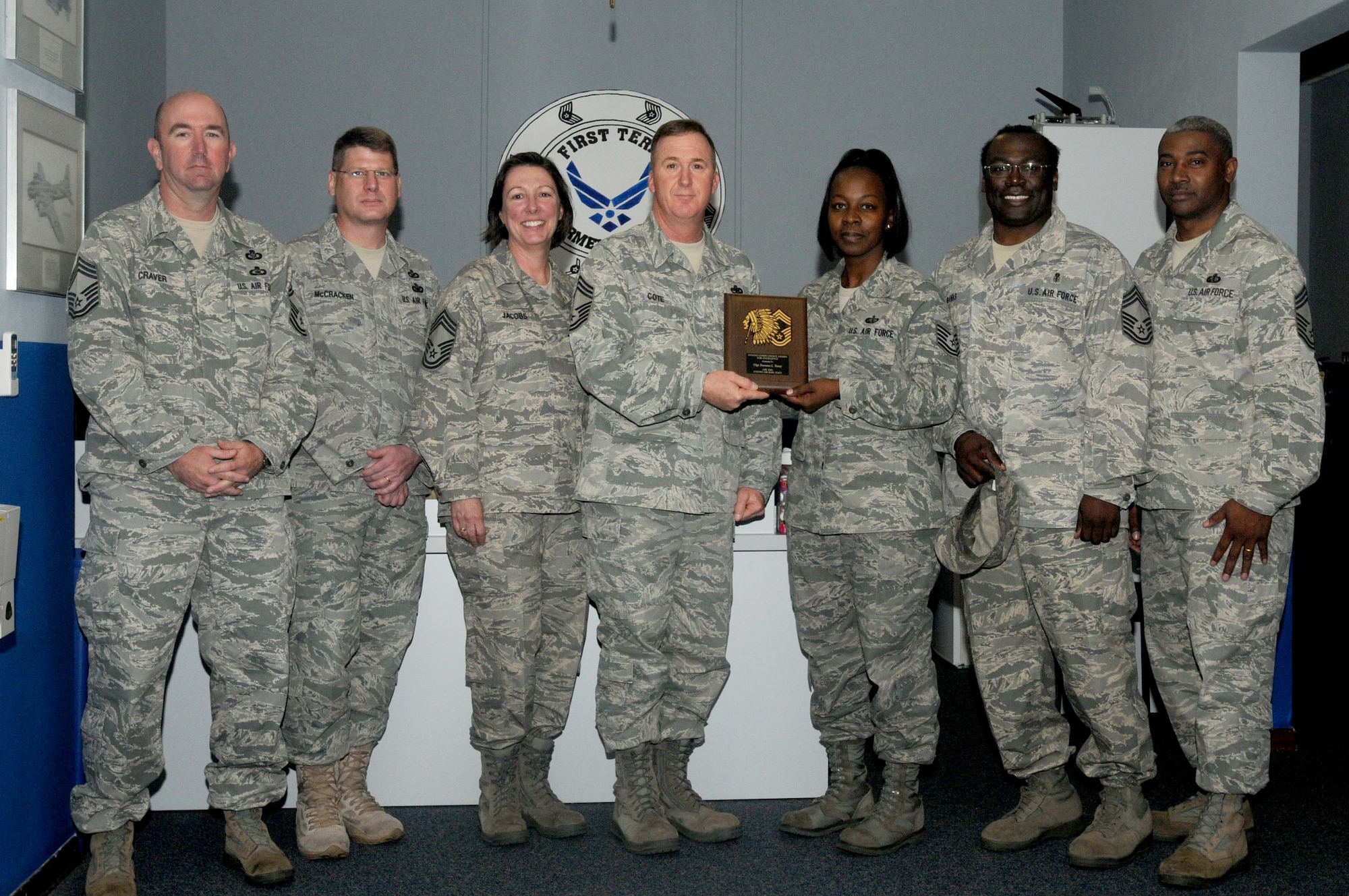 Tech. Sgt. Travana Toney, 31st Force Support  Squadron, is presented the Aviano Chief's Choice Award by the Aviano's Chief's group May 18, 2010. Aviano Chiefs present the Chief's Choice Award monthly to an Airman who clearly exceeds Air Force Standards in the areas of dress and appearance, bearing, and exceptional behavior in performance of their duties and in relationships with others.(U.S. Air Force photo/Airman LaVel Sterling)
