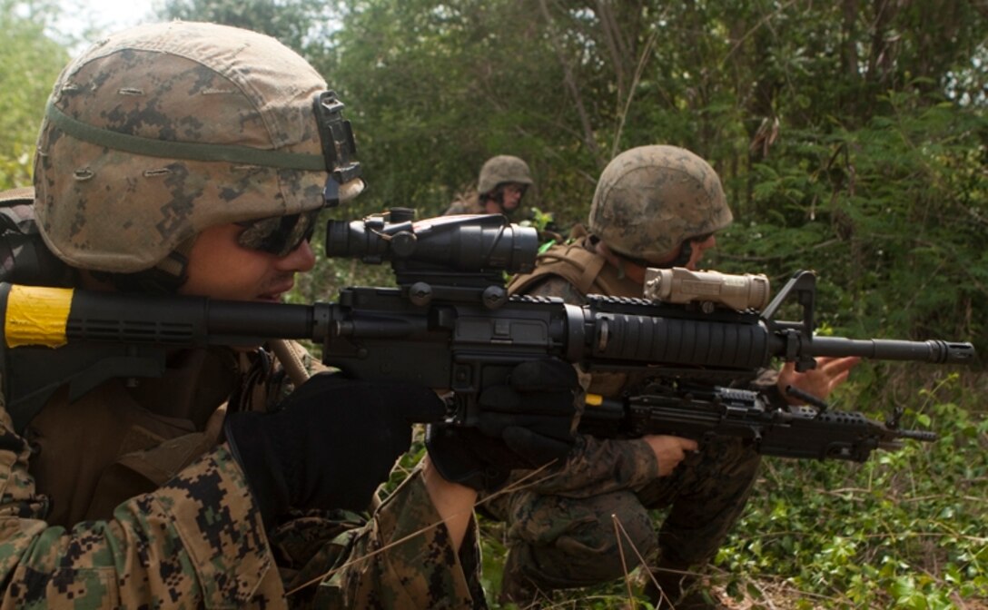 20100519-M-4896B-005 HAD YAU BEACH, Thailand – Lance Cpl. Brandon Bukrey-McCarty, fire team leader, 1st Squad, 1st Platoon, Company A, sights-in down range while he assaults the beach, here with AAV units with the Royal Thai Marine Corps May 19. Marines from the Landing Force participating in Cooperation Afloat Readiness and Training (CARAT) Thailand 2010 bilaterally assaulted the beach here with the RTMC May 19-20. Cooperation Afloat Readiness and Training is a series of bilateral exercises held annually in Southeast Asia to strengthen relationships and to enhance force readiness. (U.S. Marine Corps photo by Lance Cpl. Colby W. Brown)