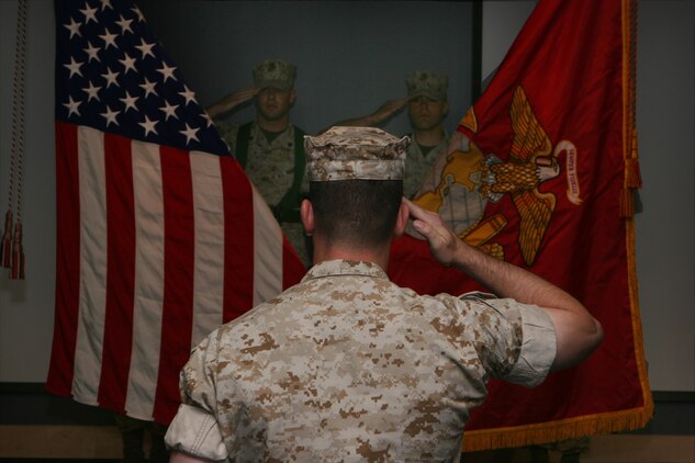 Lt. Col. Nicholas P. Vavich, the commanding officer of U.S. Marine Corps Forces, Special Operations Command’s Marine Special Operations Intelligence Battalion (MIB), salutes the colors during a ceremony, which officially activated the battalion May 18, at the MARSOC headquarters building. The battalion will train and provide intelligence to Marine special operations missions worldwide.