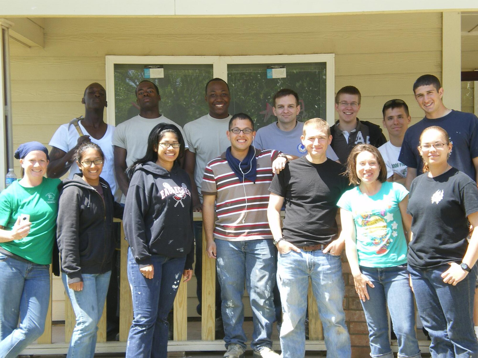 Airmen in Training from the Solid Rock Cafe Chapel Rope program volunteered to restore a home during a Habitat for Humanity project May 8, 2010 in Wichita Falls, Texas. Pictured from left to right (back row) are: Airman Reynard McCord, 366th Training Squadron; Airman Rakiam Allen, 366th TRS; Airman 1st Class Anthony Coleman, 366th TRS; Tech Sgt. Brian Schaaf, 82nd Training Wing chaplain office; Jake McDaniel, Solid Rock Cafe; Airman Kenneth Johnson, 366th TRS; Airman Daniel Kabath, 362nd TRS; (front row) Airman 1st Class Kathleen Barton, 362nd TRS; Airman 1st Class Ashley Owen, 366th TRS; Airman Olivia Oteo, 383rd TRS; Airman Jonathan Legro, 383rd TRS; Airman Joshua DeJongh, 362nd TRS; Airman 1st Class Melody Isasi, 383rd TRS; and Airman Jennifer Starcher, 383rd TRS. (U.S. Air Force photo Tech. Sgt. Brian Schaaf)