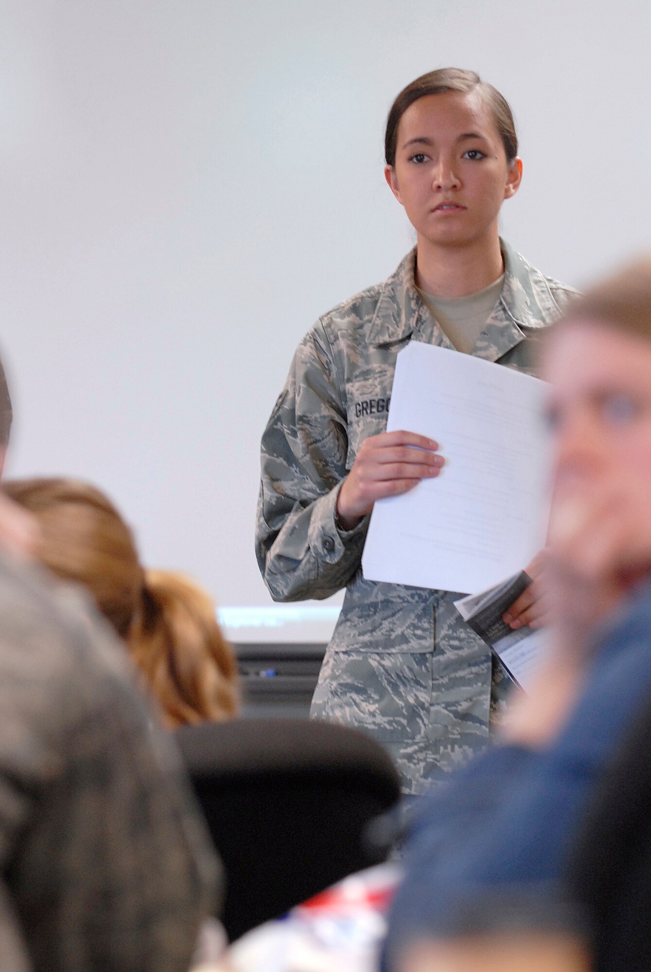 VANDENBERG AIR FORCE BASE, Calif. -- Senior Airman Melanie Gregory, 30th Logistics Readiness Squadron traffic management journeyman, gives a briefing on moving household goods during a permanent change of station information session at the Airmen and Family Readiness Center here Wednesday, May 19, 2010.  Airmen were given briefings on relocation, moving tips, finance and housing to assist with relocating.   (U.S. Air Force photo/Senior Airman Andrew Satran)