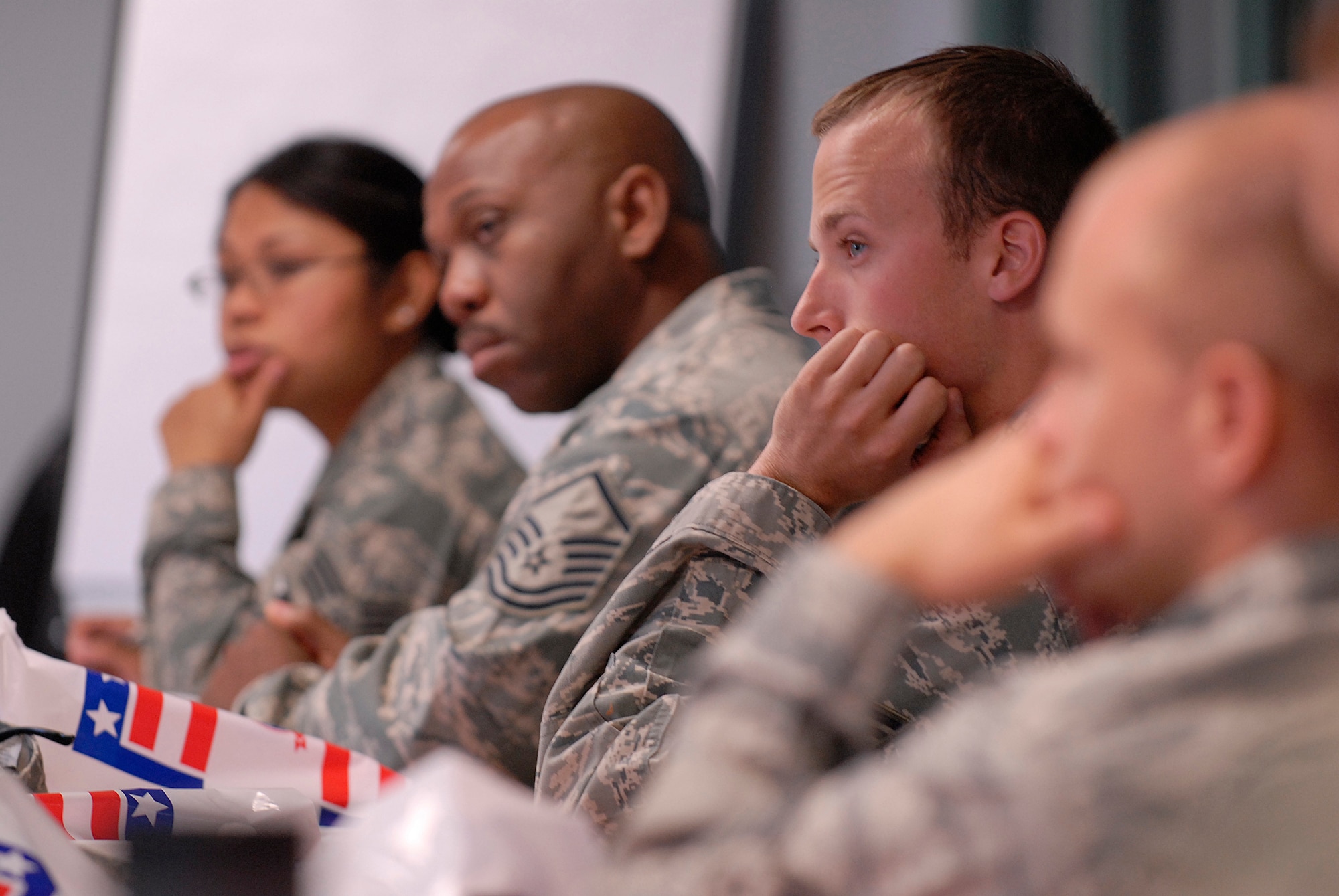 VANDENBERG AIR FORCE BASE, Calif. -- Airmen receive a briefing from the traffic management office during a permanent change of station information session at the Airmen and Family Readiness Center here Wednesday, May 19, 2010.  Airmen were given briefings on relocation, moving tips, finance and housing to assist with relocating.   (U.S. Air Force photo/Senior Airman Andrew Satran)
