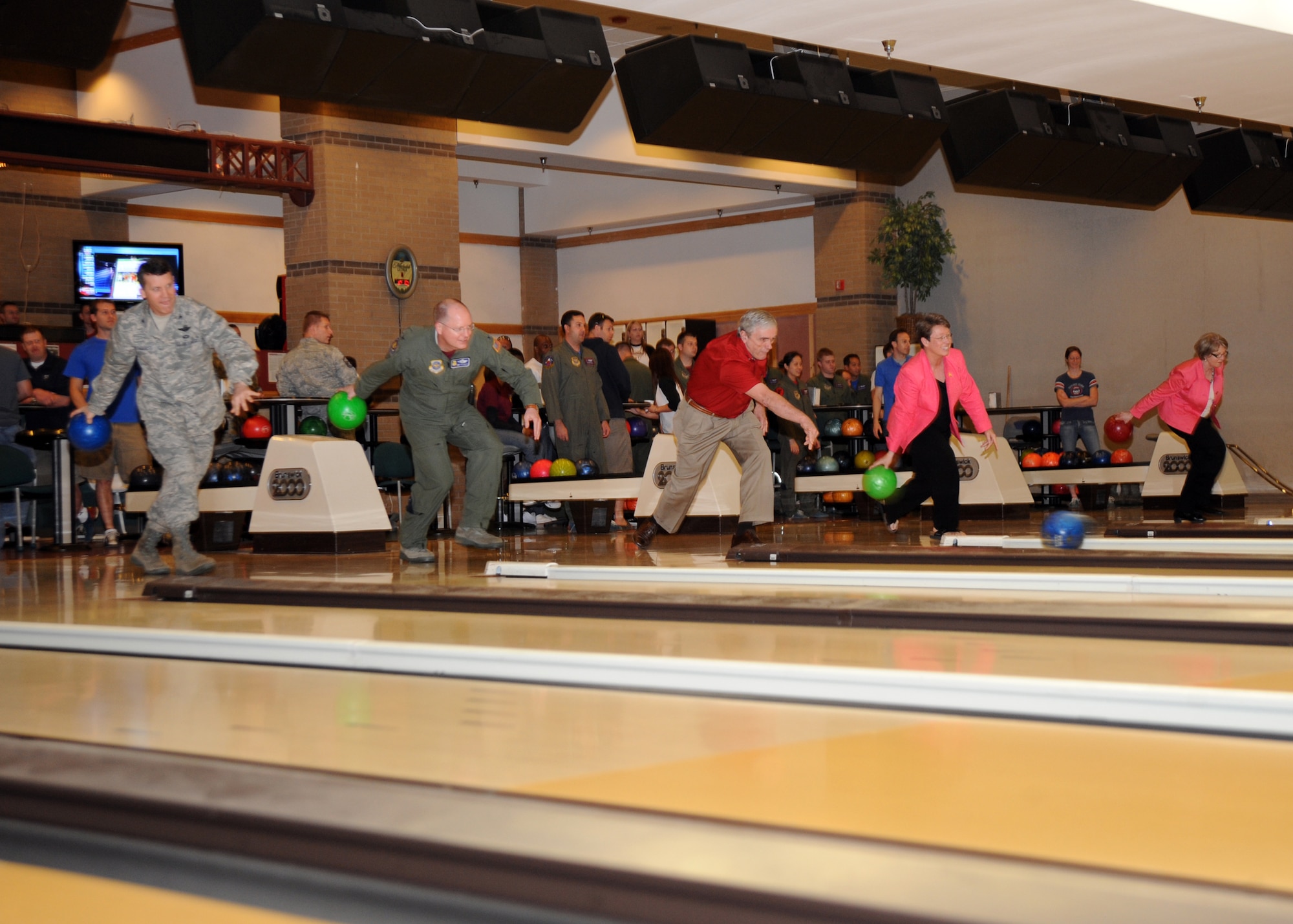 Distinguished guest bowlers from McConnell Air Force Base and community leaders bowl the first balls during the 2010 Bowl For Kids’ Sake bowl-a-thon at the Tornado Alley here, May 14, 2010.  McConnell hosted the event, which is the single largest source of donations for the Big Brothers Big Sisters foundation and contributes one-third of the foundation’s annual operating budget.  McConnell raised $16,742 from the 2009 Bowl For Kids’ Sake bowl-a-thon.  (U.S. Air Force Photo/Airman Armando A. Schwier-Morales)