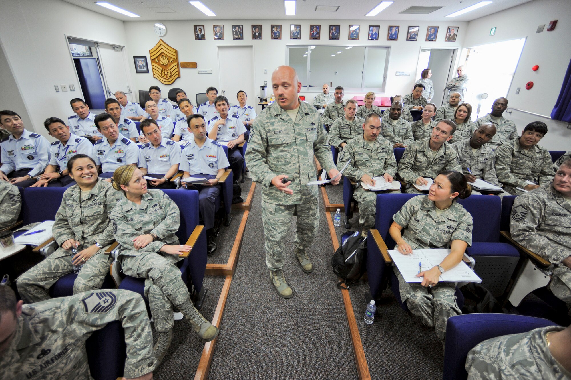 Senior Master Sgt. David Scott prepares 99 enlisted leaders from around Japan to better care for their airmen during the Additional Duty First Sergeant Seminar May 11 through 14, 2010, at Yokota Air Base, Japan. Sergeant Scott is the Air Force First Sergeant Academy active-duty course director. (U.S. Air Force photo/Osakabe Yasuo) 