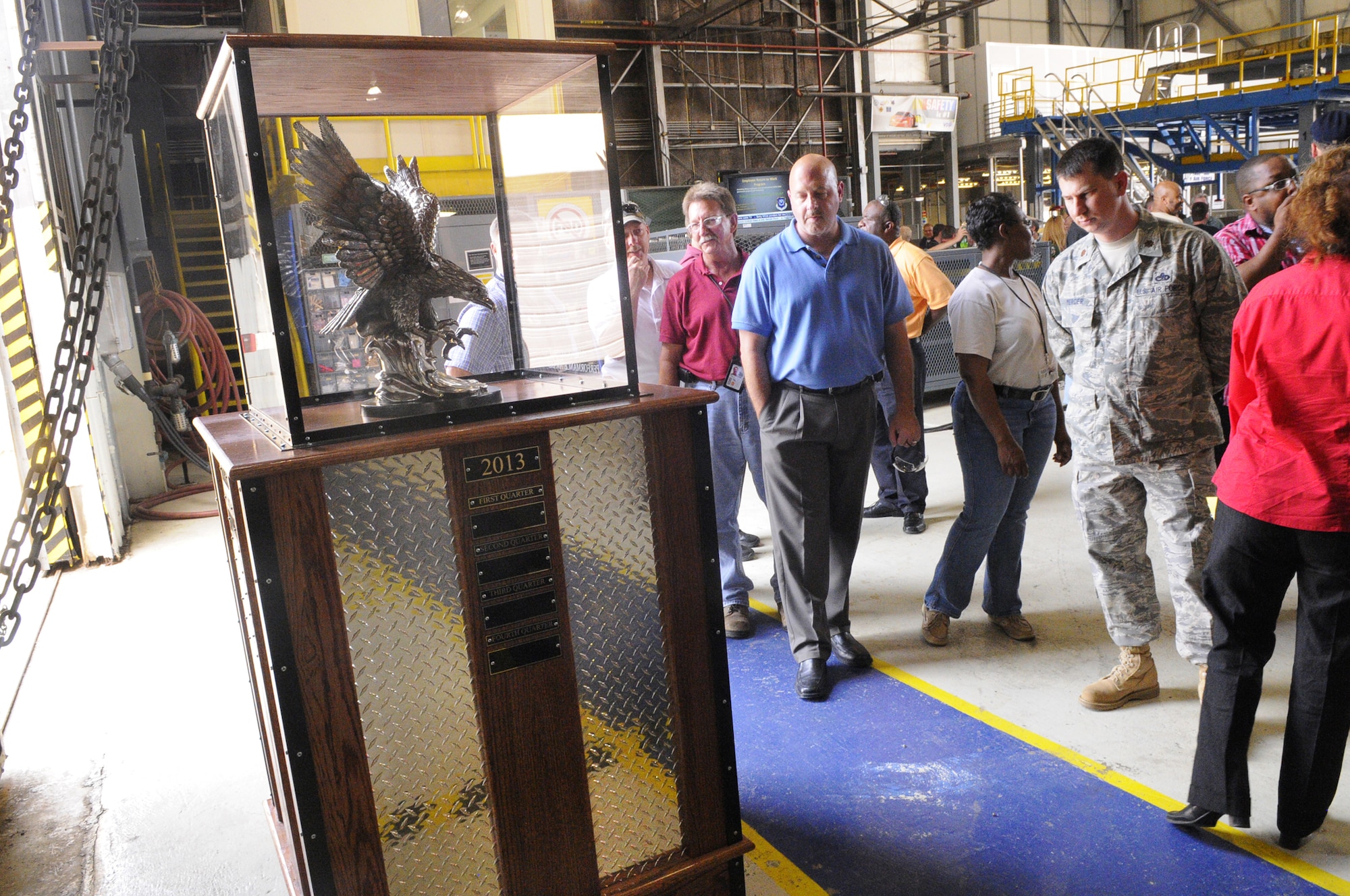 The first 402nd Aircraft Maintenance Group Production Quarterly Performance Award was presented to the C-130 High Velocity Maintenance area. U. S. Air Force photo by Sue Sapp