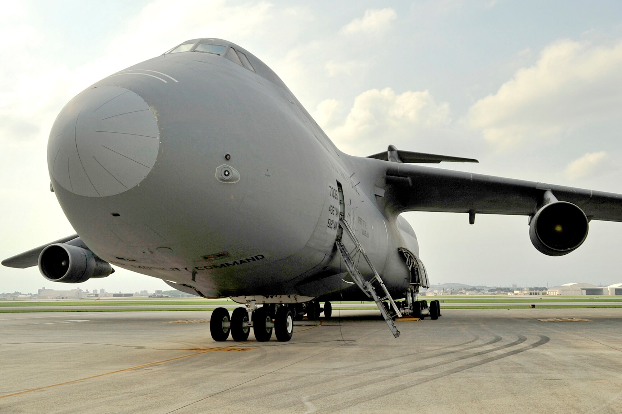 A C-5 Galaxy sits on the ramp May 13, 2010, at Kadena Air Base, Japan. Air Mobility Command officials are re-routing some C-5s and C-17 Globemaster IIIs through the Pacific region from Southwest Asia due to volcanic activity in Iceland that is affecting air traffic. (U.S. Air Force photo/Senior Airman Amanda Grabiec)
