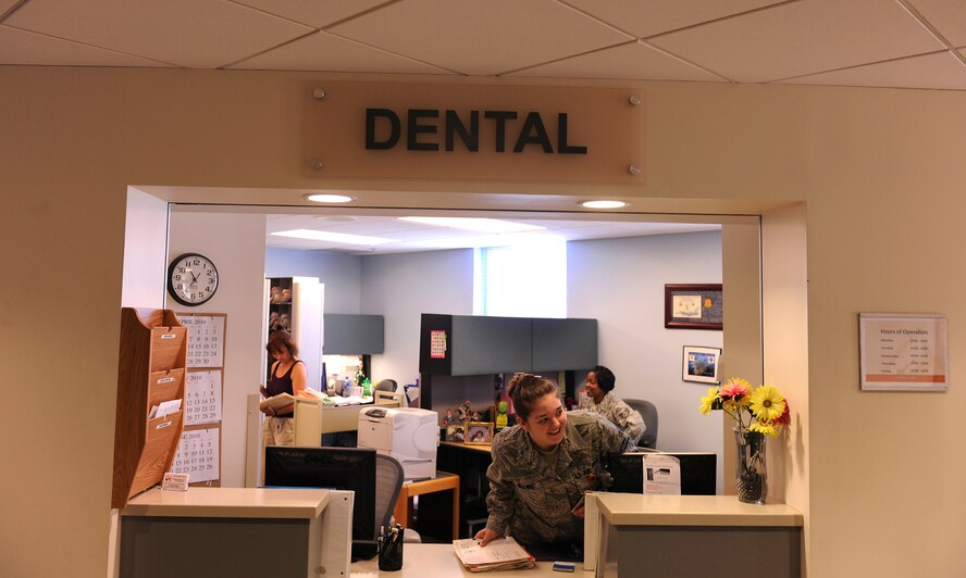 MOODY AIR FORCE BASE, Ga. -- Airman 1st Class Natalie Hellwig, 23rd Aeromedical Dental Squadron dental assistant, calls a patient to the front desk for an appointment here May 12. The dental squadron provides routine cleanings, root canals and addresses most dental concerns; if they cannot provide the service, Airmen are directed off base for care. (U.S. Air Force photo by Airman 1st Class Joshua Green/RELEASED)