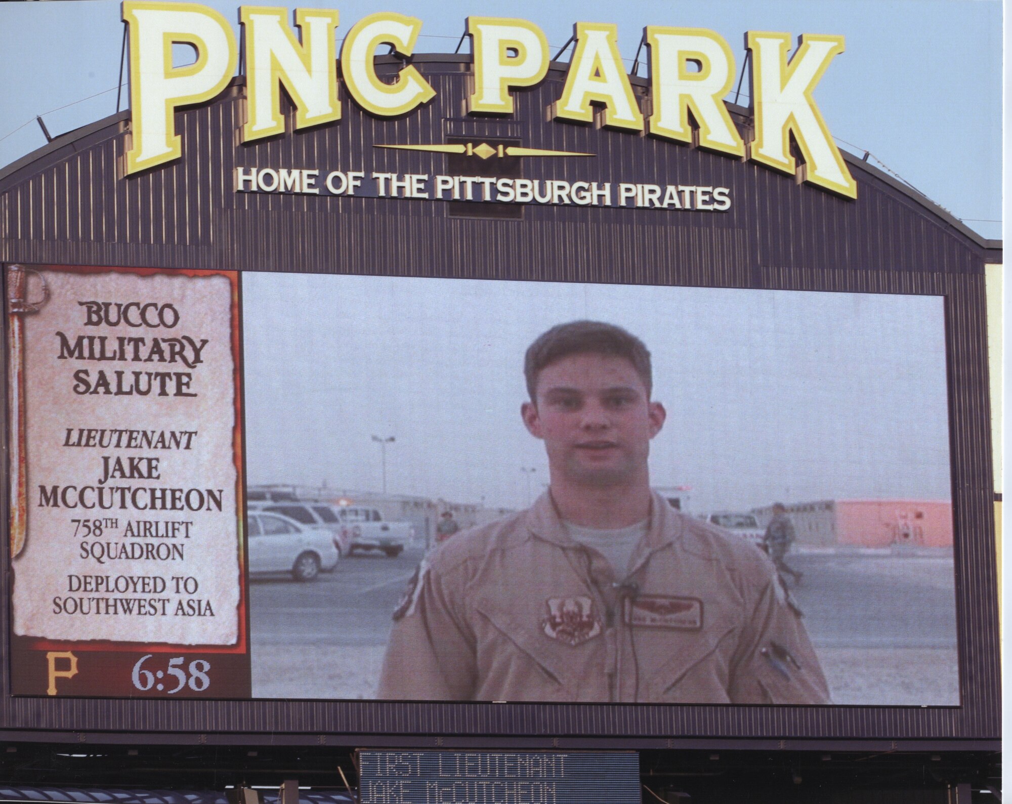 Lt. Jake McCutcheon, while deployed overseas sent home a video greeting which aired on the PNC Park scoreboard during a recent Pittsburgh Pirates home game. Sgt. George said hello to his family and kicked off the game as part of the 'Bucco Military Salute' program. Lt.. McCutcheon was part of the operations and maintenance package which returned May 19 after a successful 120-day AEF rotation in support of contingency operations overseas. (photo courtesy of the Pittsburgh Pirates)
