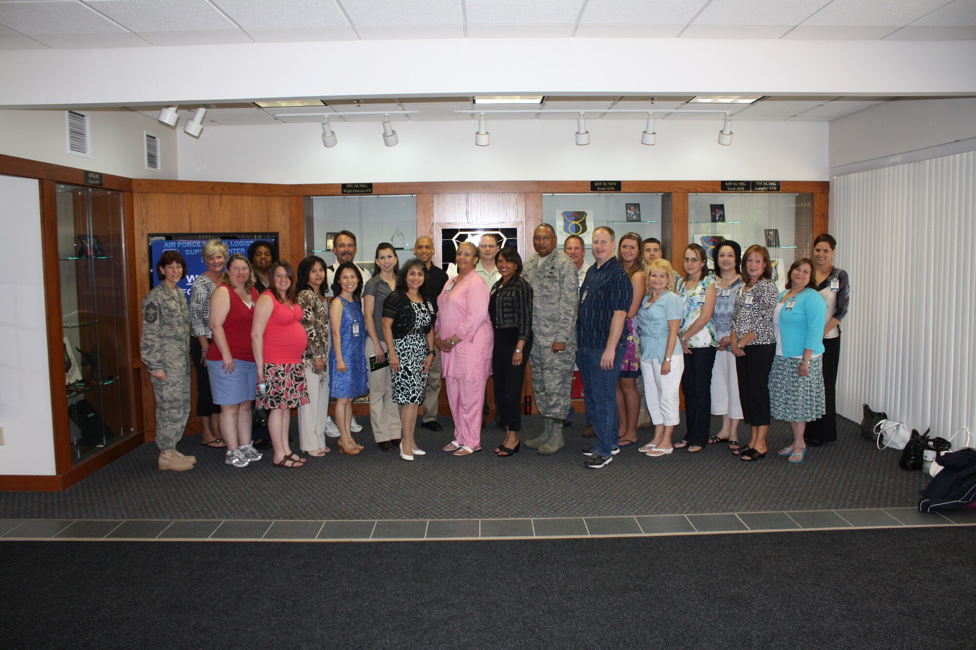 SCOTT AIR FORCE BASE, Ill -- Spouses of AFGLSC personnel gather for a group photo during the organization’s first-ever Spouses Appreciation Day May 7 at Scott. Courtesy Photo