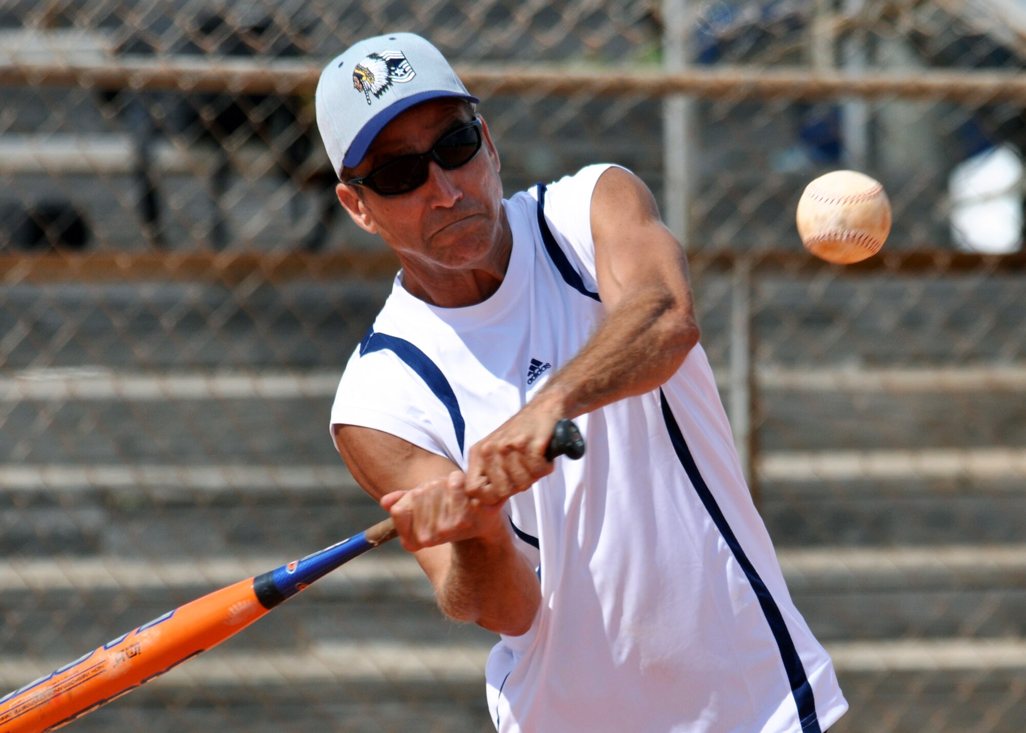 Chief Master Sgt. Todd Staats, 96th Force Support Squadron, swings for the fences during the annual Chiefs V/S Eagles softball match at Eglin Air Force Base, Fla., May 17.  The Eagles narrowly won 9-8 in extra innings.  (U.S. Air Force photo/Samuel King Jr.)
