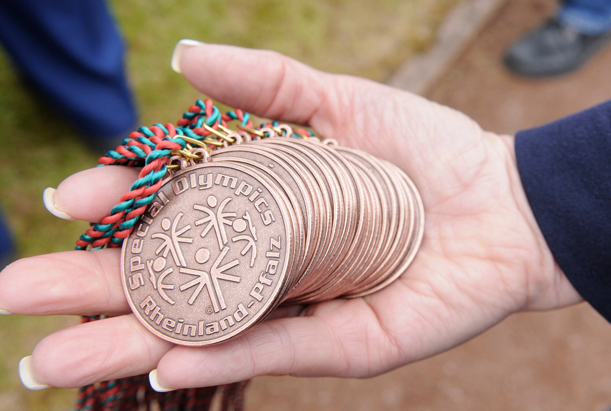 Medallions are displayed May 12, 2010, during the Special Olympics in Enkenbach-Alsenborn, Germany. The Special Olympics is a worldwide event for children and adults with disabilities to build confidence and foster friendships. The Kaiserslautern Military Community hosted its 27th Annual Special Olympics for more than 800 athletes. (U.S. Air Force photo/Airman 1st Class Brittany Perry)