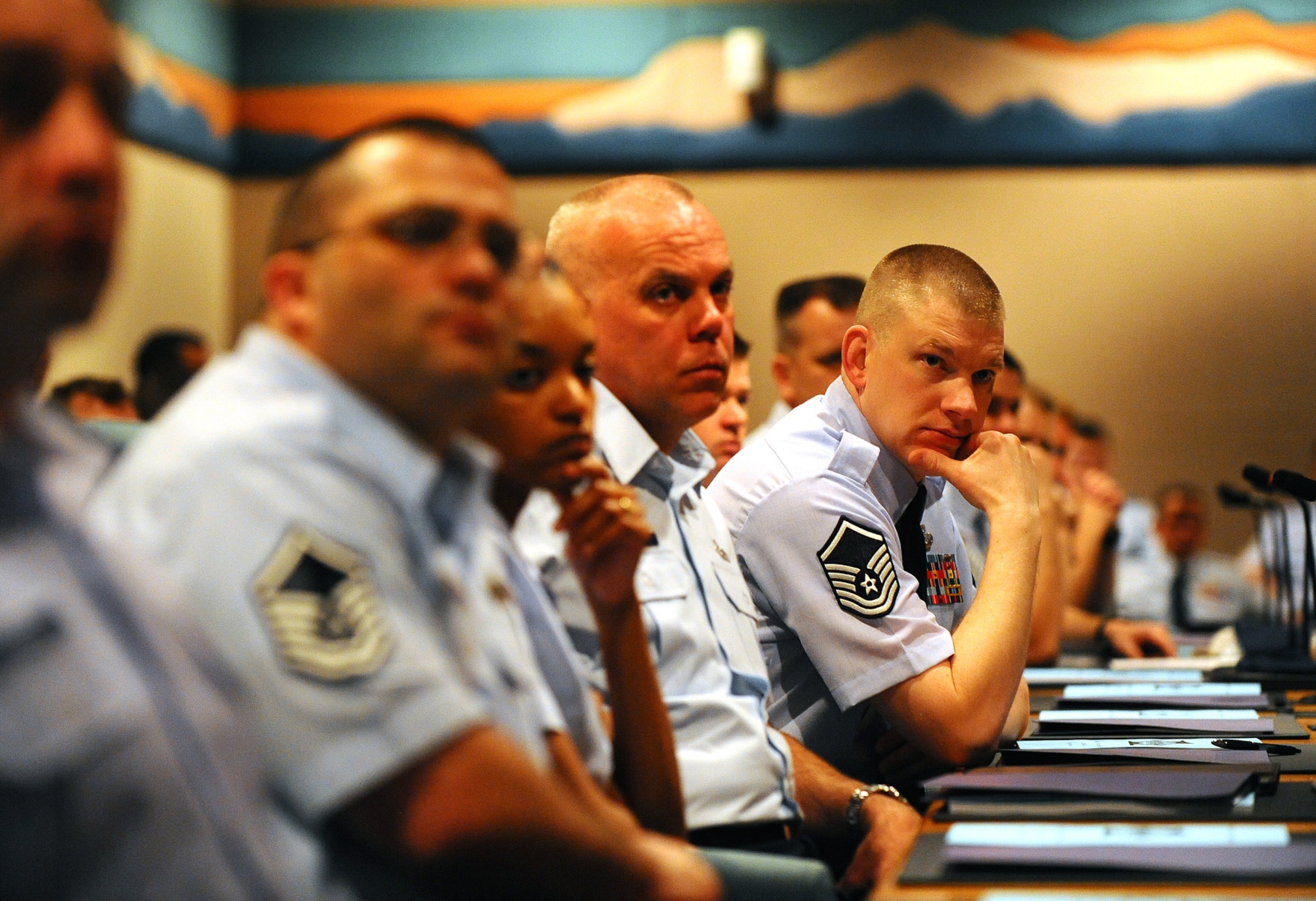 OFFUTT AIR FORCE BASE, Neb. -- Master Sgt. James Marc, Ellsworth AFB, S.D., listens to Brig. Gen. John N.T. Shanahan, 55th Wing commander, give opening remarks at the Annual First Sergeant Symposium, a week-long training course hosted by Offutt at the Dougherty Conference Center here May 17.  Prospective first sergeants from across Air Combat Command take part in the seminar to gain information about what is required to be a first sergeant. U.S. Air Force Photo by Josh Plueger
