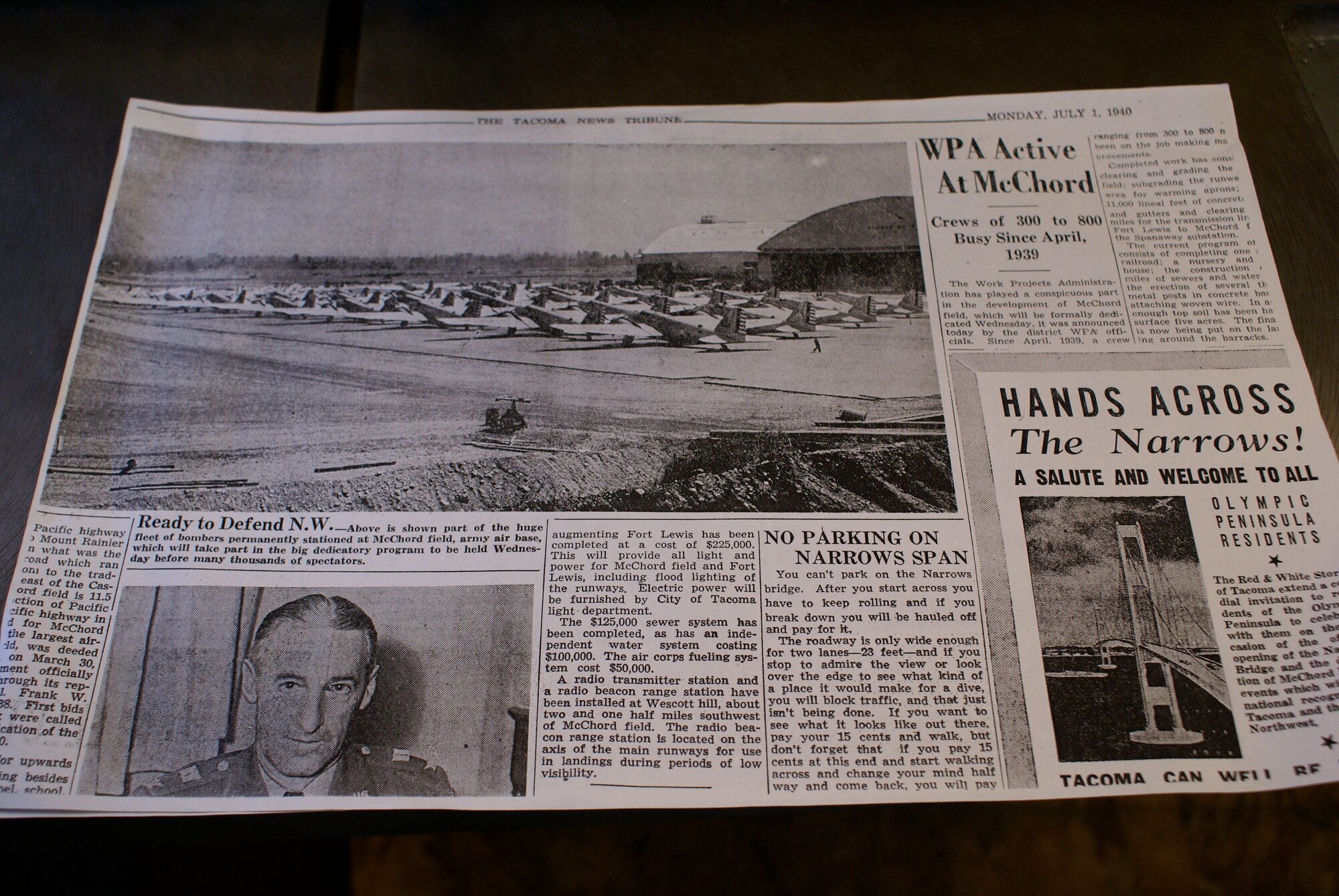 A historical photograph in a newspaper shows the McChord Field flightline filled with B-18 bombers.  A volunteer restoration crew has been restoring a B-18 for more than 20 years, completely rebuilding the aircraft from the ground up.  The aircraft now rests on Heritage Hill, representing similar aircraft that were assigned to the 17th Bomb Group here at McChord when it opened as an Army base in 1940.  (U.S. Air Force photo/Capt. Ali Kojak)

