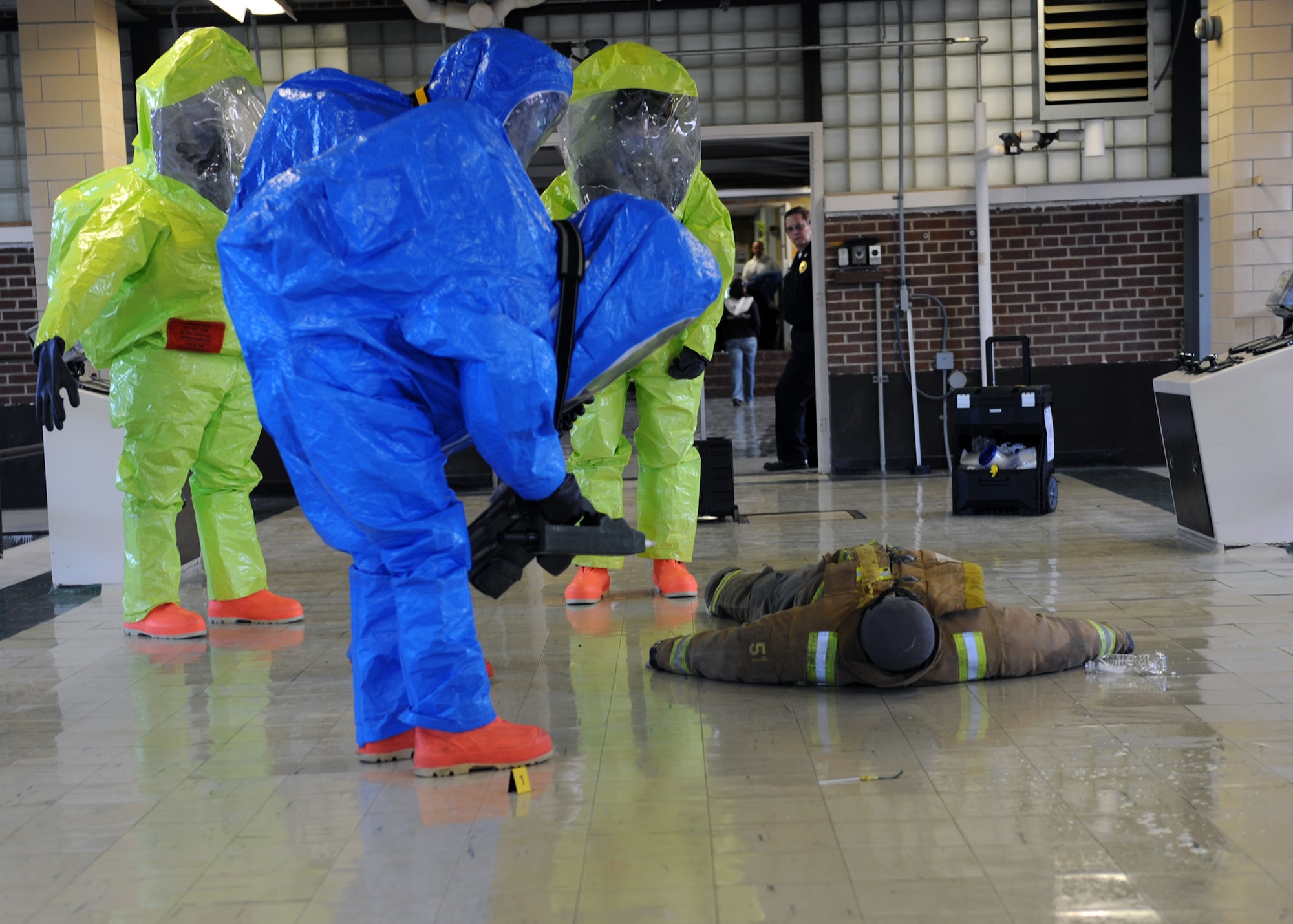 MINOT, N.D. – Members of the Army National Guard 81st Civil Support Team check for chemical and radioactive exposure of a “patient” during a joint antiterrorism exercise held at the Minot Water Treatment Facility June 3. The exercise involved several agencies, including the base, Bismarck Army National Guard, Minot Fire and Rescue Service, and the Minot Police Department. The teamwork and coordination between base agencies during exercises like these are why the Minot AFB antiterrorism program won the Air Force Global Strike Command’s Best Installation Antiterrorism Program of the Year for 2009. (US Air Force photo by Staff Sgt. Keith Ballard)
