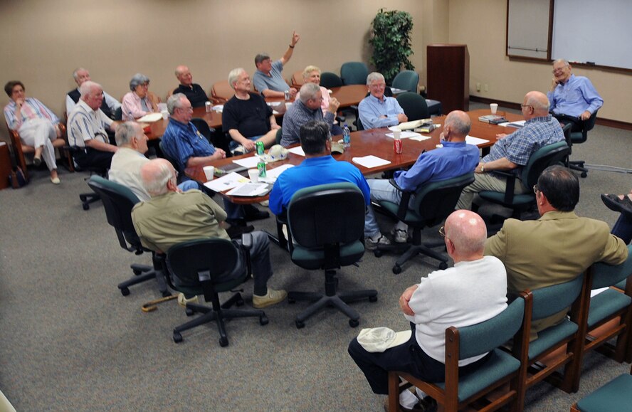 OFFUTT AIR FORCE BASE, Neb. -- Members of Offutt's Professional Reading Society discuss the book "LeMay: The life and wars of General Curtis LeMay" by Warren Kozak at the Thomas S. Power Library here May 18. Among his many accomplishments, General LeMay served as the commander of Strategic Air Command here from October 1948 to June 1957 and later served as Air Force chief of staff. The LeMay Aero Club is named in his honor. U.S. Air Force Photo by Jeff W. Gates.