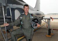 Pro golfer Bob Kendall pauses for a photo prior to an orientation flight on a T-38 Talon at Randolph Air Force Base, Texas. The orientation flights were offered to the golfers, as part of the Air Force recruiting program, during the PGA Valero Open Tournament in San Antonio. (U.S. Air Force photo by David Terry)