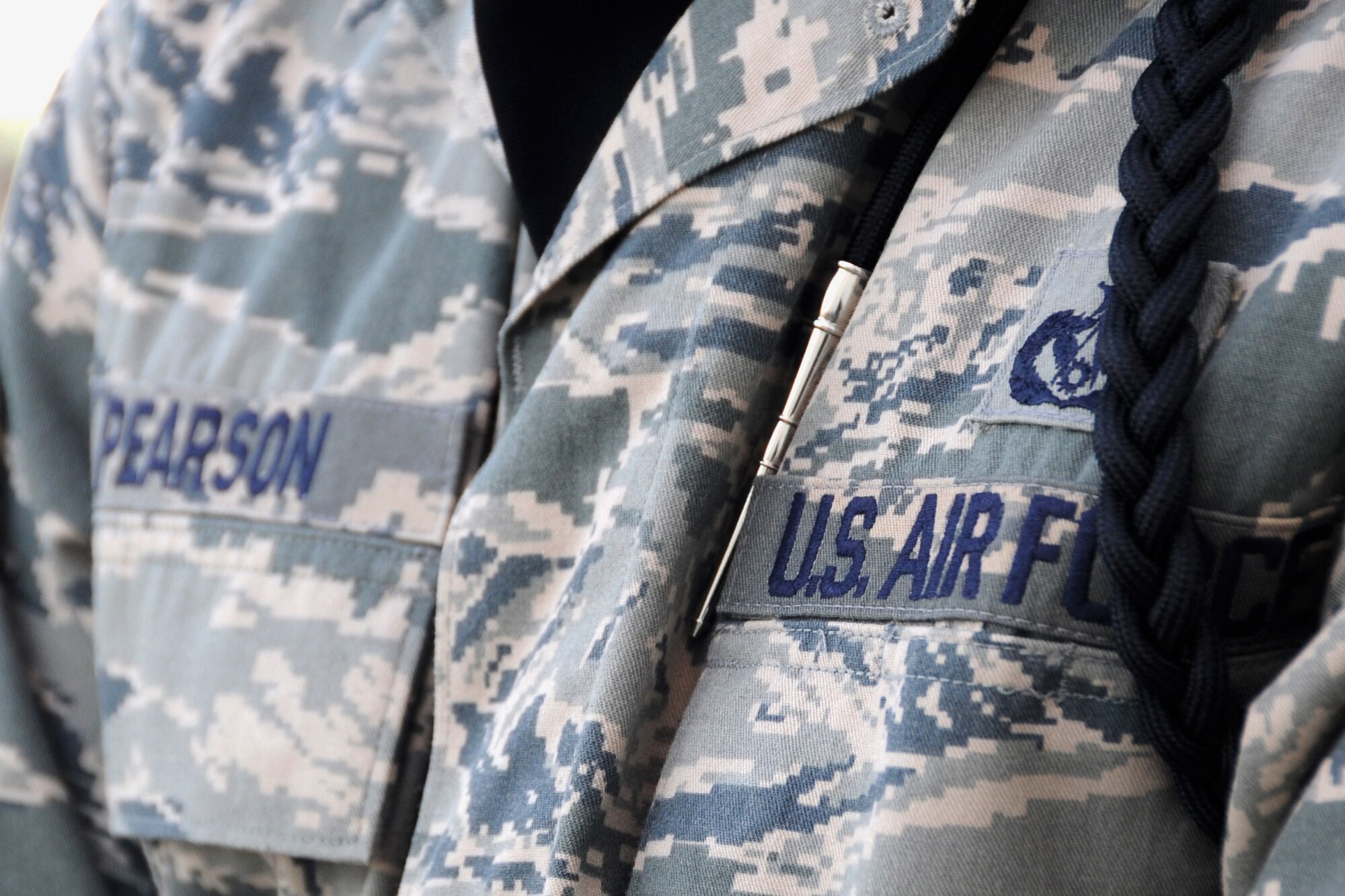 An honor guard member?s uniform is shown during a retreat performance at an undisclosed location in Southwest Asia on May 14, 2010.  Honor Guard members put extra time and effort into getting their uniforms in top shape each day even in the deployed location. They are always ready to perform at various events and ceremonies across the base. Airmen from across the wing join every week to pay respect during retreat. The 380th AEW supports Operations Iraqi Freedom and Enduring Freedom and the Combined Joint Task Force-Horn of Africa. The 380th AEW is comprised of four groups and 12 squadrons and the wing's deployed mission includes air refueling, surveillance and reconnaissance in support of overseas contingency operations in Southwest Asia.(U.S. Air Force photo/Senior Airman Jenifer H. Calhoun/Released)