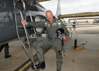 Pro golf caddie Bradley Whittle  pauses for a photo prior to an orientation flight on a T-38 Talon at Randolph Air Force Base, Texas. The orientation flights were offered to the golfers, as part of the Air Force recruiting program, during the PGA Valero Open Tournament in San Antonio. (U.S. Air Force photo by David Terry)