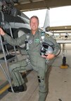 Pro golfer Dean Prang pauses for a photo prior to an orientation flight on a T-38 Talon at Randolph Air Force Base, Texas. The orientation flights were offered to the golfers as part of the Air Force recruiting program during the PGA Valero Open Tournament in San Antonio. (U.S. Air Force photo by Dave Terry)