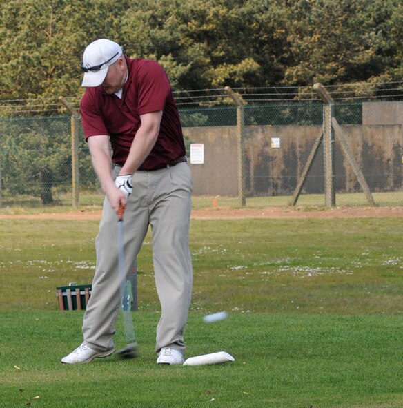 RAF Mildenhall, England -- Brian Szarek, 100th Maintenance Squadron, drives off the 415-yard par 4 second tee box during Intramural Golf at Breckland Pines Golf Club, May. 8. (U. S. Air Force photo by Gary Rogers)