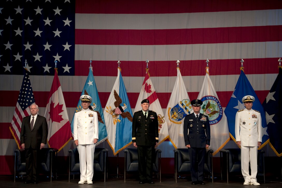 Navy Adm. Mike Mullen, chairman of the Joint Chiefs of Staff, and Defense Secretary Robert M. Gates attend the U.S. Northern Command/ North American Aerospace Defense Command Change of Command ceremony on Peterson Air Force Base, Colo., May 19, 2010. U.S. Air Force Gen. Gene Renuart was relieved by Navy Adm. Sandy Winnefeld.