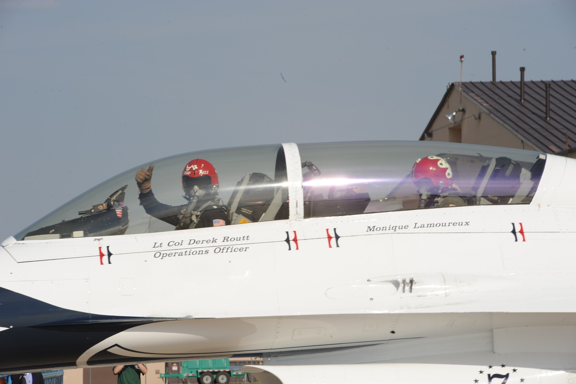 Lt Col. Derek Routt, U.S. Air Force Thunderbirds, gives a thumbs-up before takeoff May 20 at Grand Forks Air Force Base, N.D. Colonel Routt was chosen as the pilot for the Hometown Heroes incentive flight. Hometown Heroes is a program that recognizes ordinary people as heroes throughout the community. (U.S. Air Force photo by Airman 1st Class Amber Price)