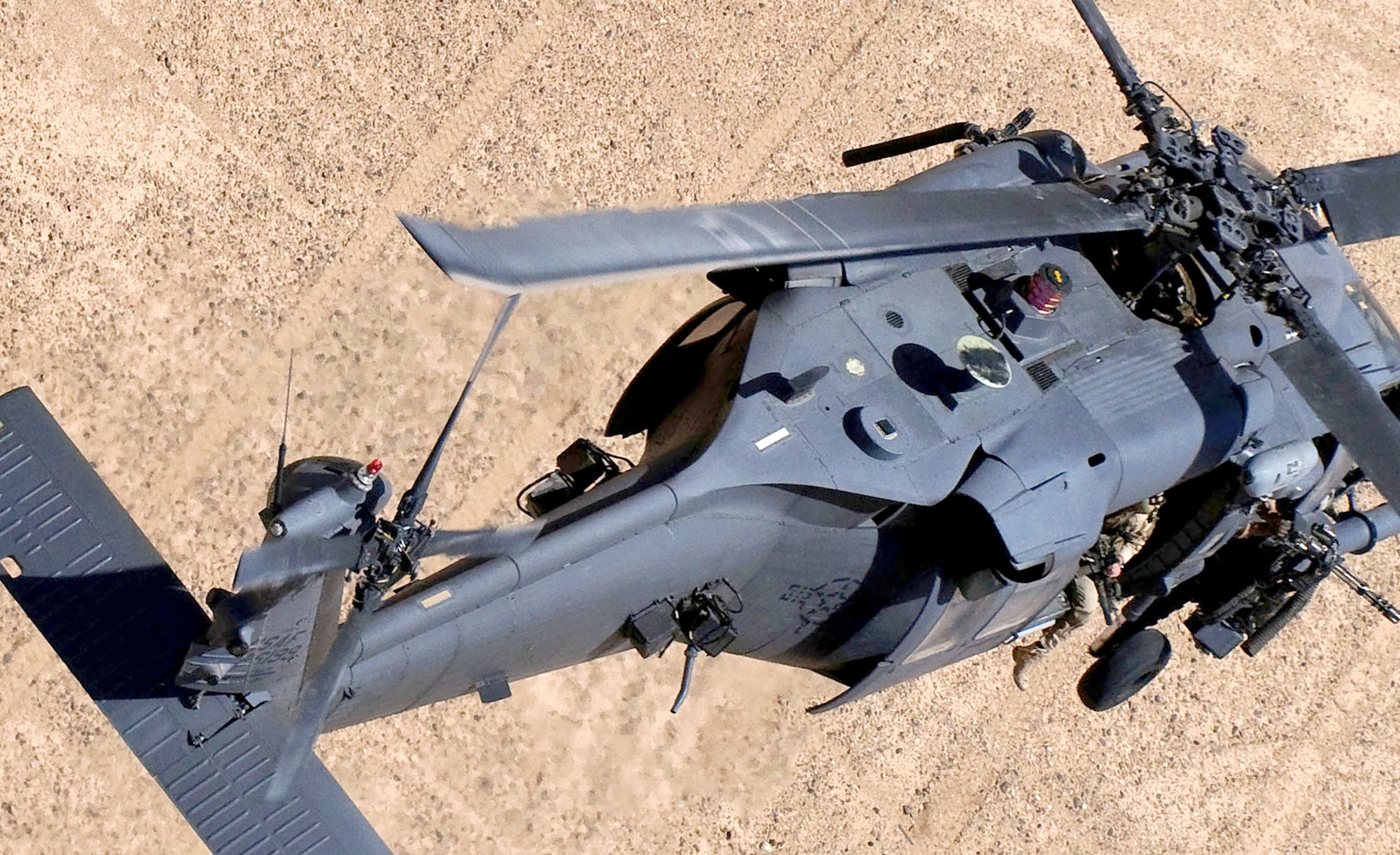 An HH-60G Pavehawk from the 129th Expeditionary Rescue Squadron flies June 12, 2009, over Afghanistan. The crew of "Pedro 16", Capt. Robert Rosebrough, 1st Lt. Lucas Will, Master Sgt. Dustin Thomas and Staff Sgt. Tim Philpott, from the 33rd Rescue Squadron at Kadena Air Base, Japan, were recently announced as the 2009 MacKay Trophy winners. (Courtesy photo) 
