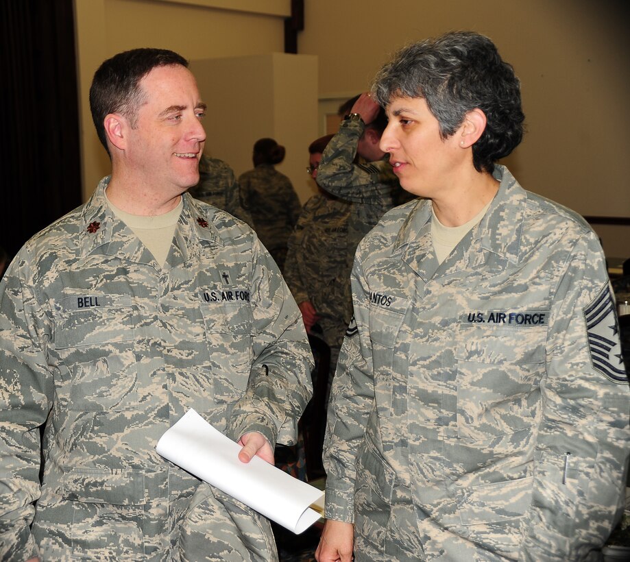 Chaplain (Maj.) Howard Bell and Command Chief Master Sgt. Sandra Santos discuss upcoming exercise issues.  They are part of the 932nd Airlift Wing command staff and are always focused on issues affecting Airmen in the Air Force Reserve unit.  (U.S. Air Force photo/Maj. Stan Paregien)