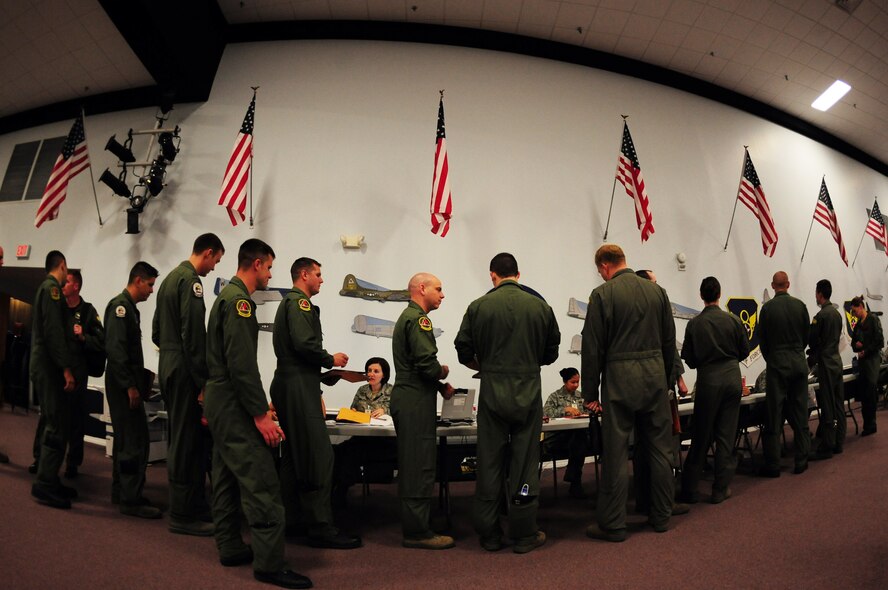 BARKSDALE AIR FORCE BASE, La. – Flight crew participants in a Nuclear Operational Readiness Exercise process through a mock deployment line at Hoban Hall May 18. With a Nuclear Operational Readiness Inspection this summer, Barksdale Airmen are expected to adapt and overcome, perform with fewer errors and properly execute missions during the NOREs in mid-May and early June. (U.S. Air Force photo by Senior Airman Joanna M. Kresge)
