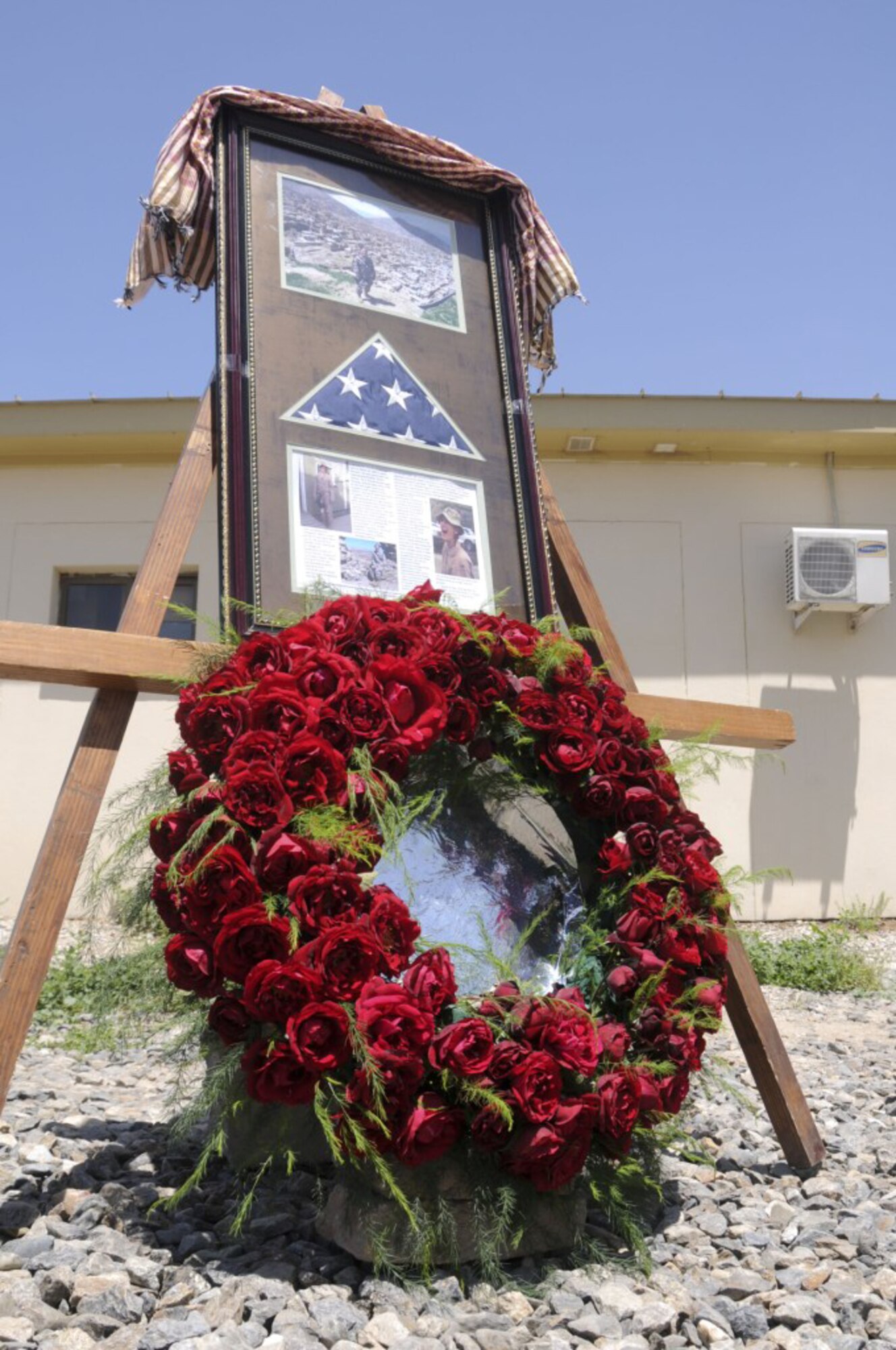 A memorial to 1st Lt. Roslyn Schulte stands on display during a ceremony in Kabul, Afghanistan, May 20, 2010. Lieutenant Schulte, a 2006 graduate of the U.S. Air Force Academy in Colorado Springs, Colo., was killed May 20, 2009, when her vehicle was struck by a roadside bomb. Buildings at Camp Eggers and Sia Sang in Kabul were named in her honor during the ceremony. (U.S. Air Force photo/Staff Sgt. Rachel Martinez)