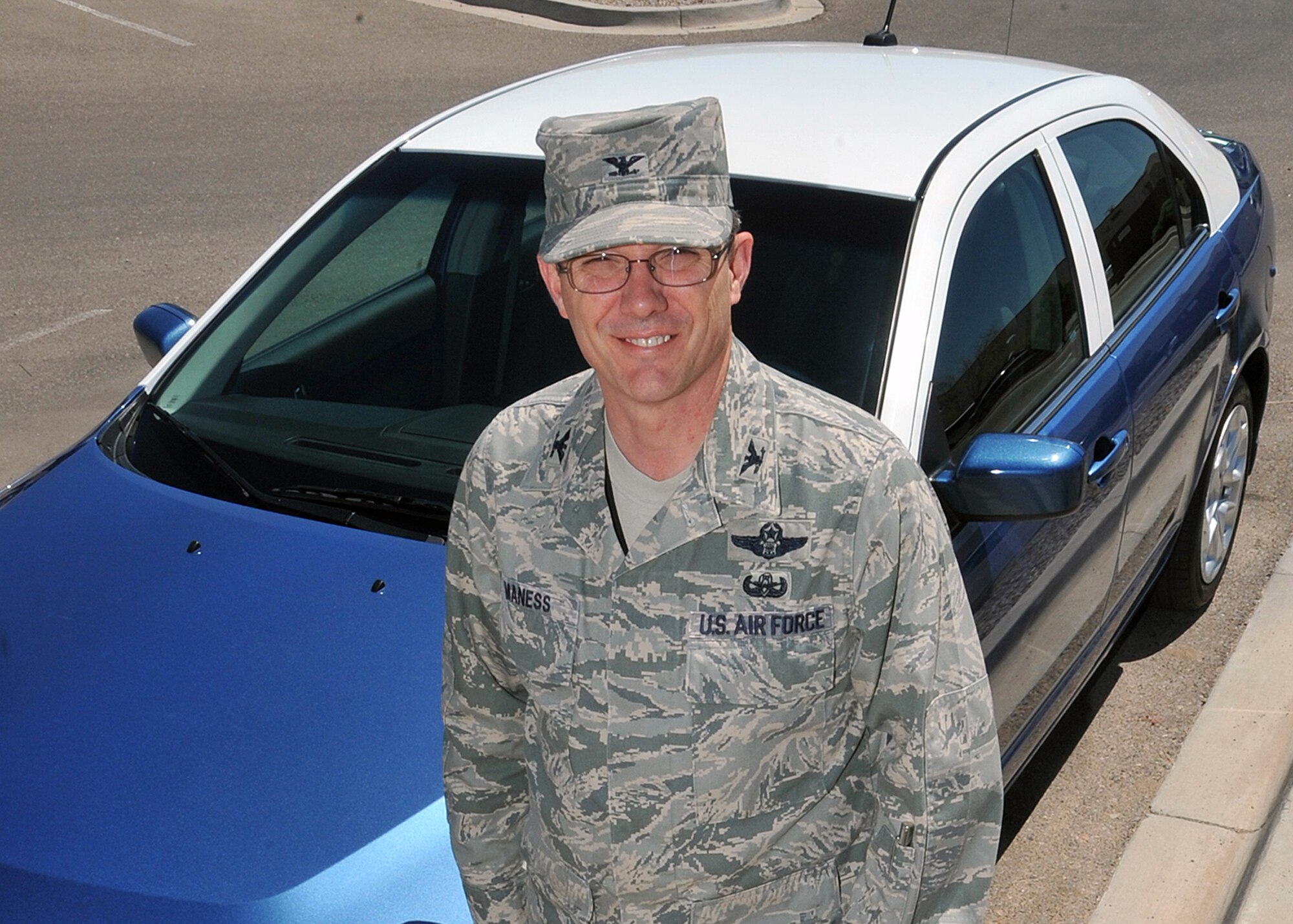 One of the first things Col. Robert Maness, 377th Air Base Wing commander, did after taking command, was trade in his SUV for a more fuel efficient sedan. U.S. Air Force photo by Todd Berenger