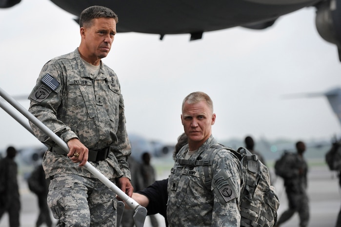 Brian McNamara and Terry Serpico stand on the staircase of a Charleston C-17 at Joint Base Charleston May 18. The Lifetime Television series Army Wives, filmed an upcoming episode at Joint Base Charleston. The episode is scheduled to air July 18. Mr. McNamara and Mr. Serpico are actors on the show.  