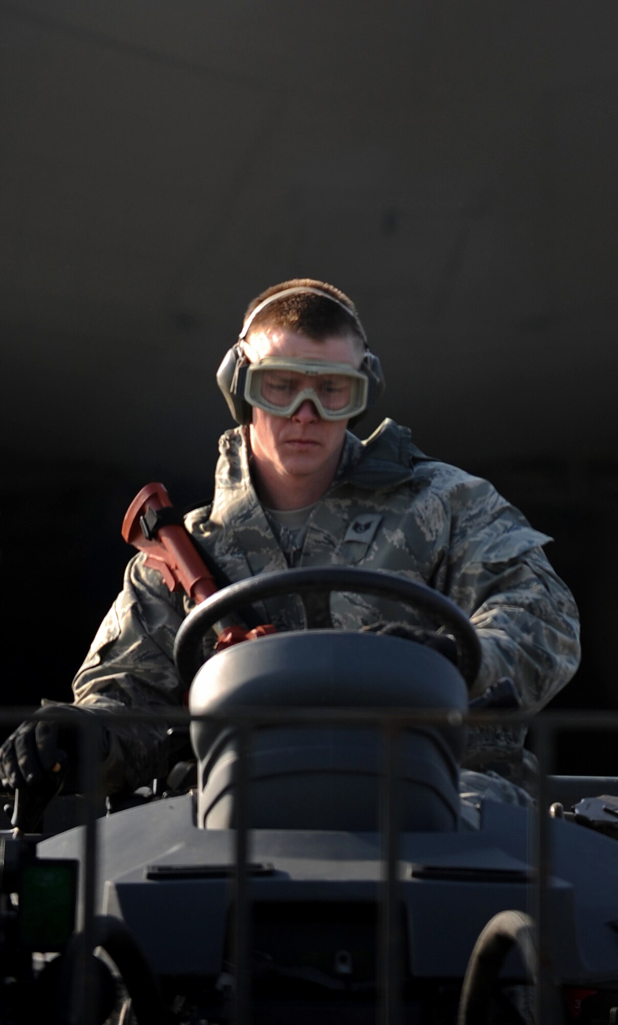 U.S. Air Force Staff Sgt. Andrew Bowman, 435th Air Mobility Squadron air transportation, operates a forklift loaded with equipment during an Operational Readiness Exercise, Flugplatz Bitburg, Germany, May 17, 2010. This ORE is the third of five exercises held to prepare Airmen for an upcoming Operational Readiness Inspection. The exercise held in Bitburg consisted of over 100 personnel, spanning 30 Air Force Specialty Codes and three wings. (U.S. Air Force photo by Airman 1st Class Grovert Fuentes-Contreras)