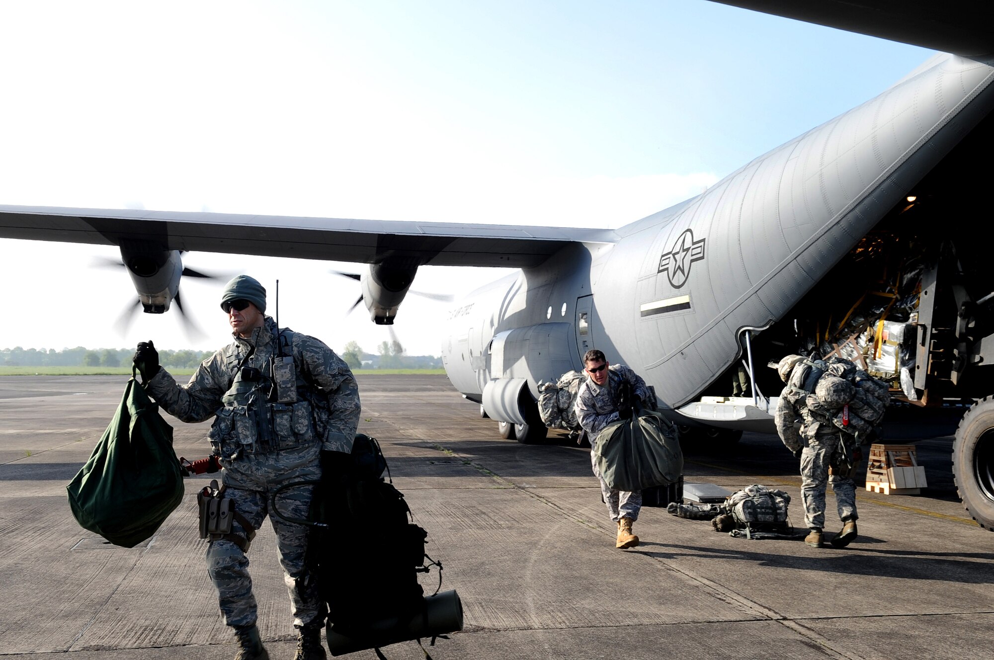 U.S. Air Force Lt. Col. Charles Schlegel, 435th Air Mobility Squadron commander, unloads a C-130J Super Hercules during an Operational Readiness Exercise, Flugplatz Bitburg, Germany, May 17, 2010. This ORE is the third of five exercises held to prepare Airmen for an upcoming Operational Readiness Inspection. The exercise held in Bitburg consisted of over 100 personnel, spanning 30 Air Force Specialty Codes and three wings. (U.S. Air Force photo by Airman 1st Class Grovert Fuentes-Contreras)