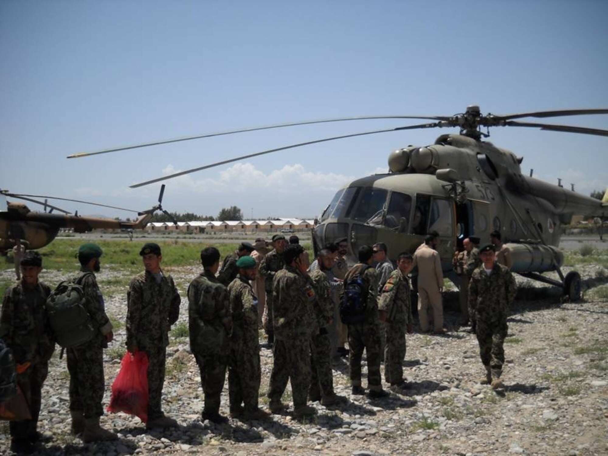 Members of the Afghan National Army board an Afghan National Army Air Corps Mi-17 transport helicopter on May 13, 2010.  (U.S. Military photo/RELEASED)