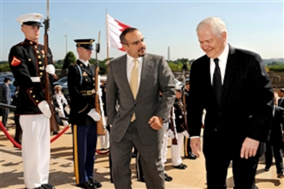 U.S. Defense Secretary Robert M. Gates, right, escorts Bahrain's Crown Prince Shaikh Salman bin Hamid Al-Khalifa through a cordon of honor guards and into the Pentagon, May 20, 2010.
 Shaikh Salman, who is the commander-in-chief of the defense forces of Bahrain, will meet with Gates to discuss several security issues of mutual interest to both nations.