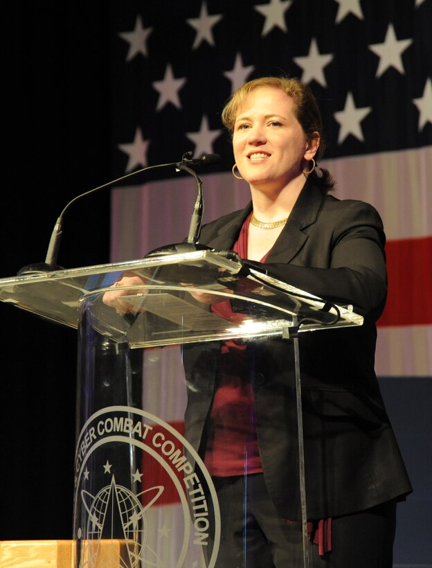 Ms. Erin Conaton, Undersecretary of the Air Force, delivers a speech at Guardian Challenge 2010 Opening Ceremony May 21 at Peterson Air Force Base, Colo. (Photo by Lou Hernandez)