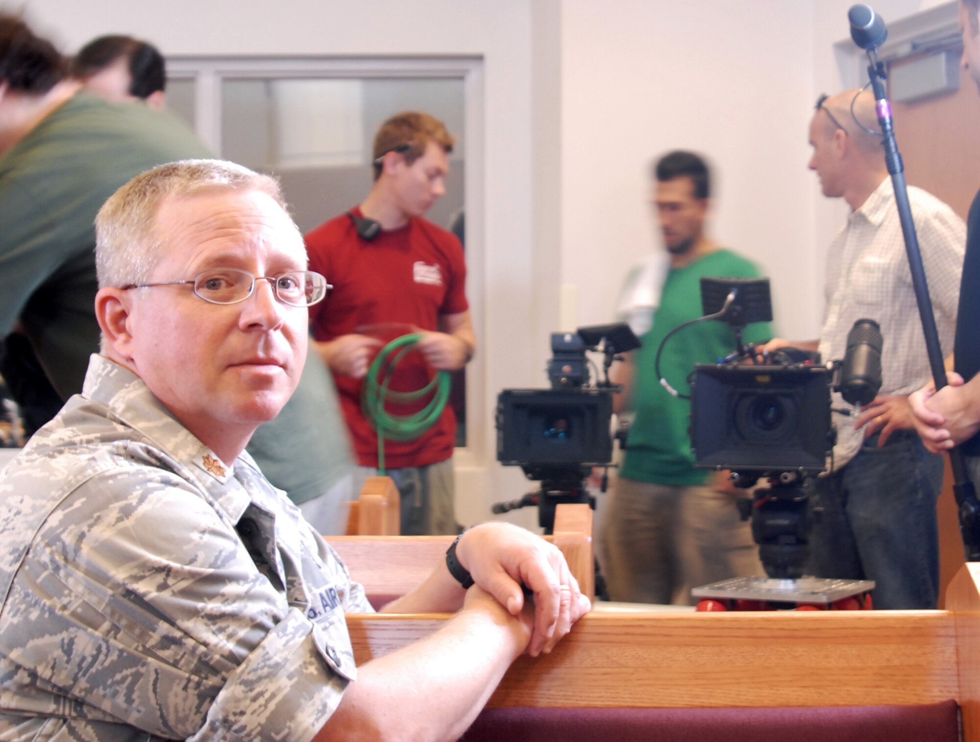 Chaplain (Maj.) Sammy Tucker, Senior Protestant Chaplain, Goodfellow AFB Texas, waits to be interviewed by a video production crew May 21.  The crew works for Air Force Recruiting Service.  AFRS visited the base May 17 – 21 to film technical training and lifestyle highlights here for the Air Force website, AirForce.com.  (U.S. Air Force photo/Robert D. Martinez)