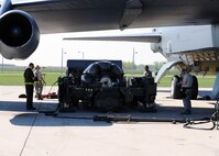 MINOT AIR FORCE BASE, N.D. -- Airmen from the 17th Munitions Squadron inspect a missile pylon for defects before it is loaded onto a B-52H Stratofortress during the recent Prairie Vigilance 10-5 exercise here May 17. Prairie Vigilance exercises test the 5th Bomb Wing's nuclear mission capabilities ensuring the wing continues to conduct safe, secure and effective nuclear operations. (U.S. Air Force photo by Staff Sgt. Keith Ballard)