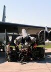 MINOT AIR FORCE BASE, N.D. -- Airmen from the 17th Munitions Squadron inspect a missile pylon for defects before it is loaded onto a B-52H Stratofortress during the recent Prairie Vigilance 10-5 exercise here May 17. Prairie Vigilance exercises test the 5th Bomb Wing's nuclear mission capabilities ensuring the wing continues to conduct safe, secure and effective nuclear operations. (U.S. Air Force photo by Staff Sgt. Keith Ballard)