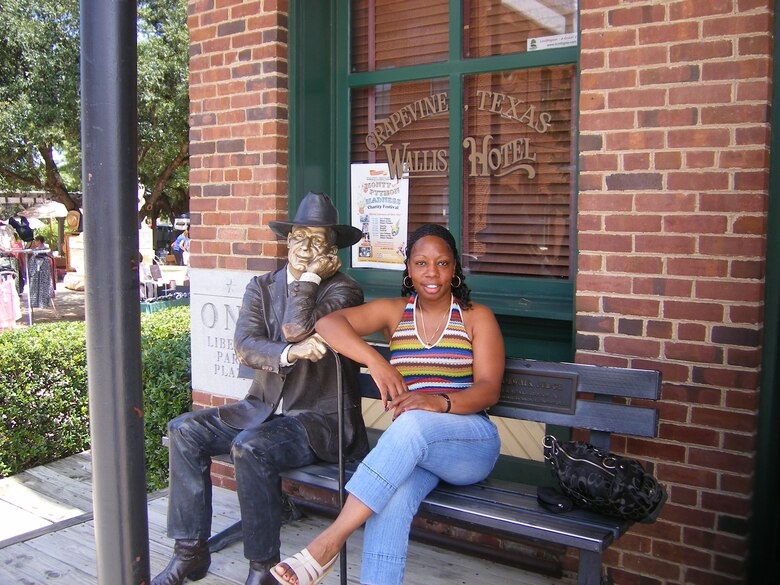 BARKSDALE AIR FORCE BASE, La. – Master Sgt. Keisha Yarbrough takes time out of her busy schedule as the 2d Medical Group first sergeant, to relax and pose in front of the Willis Hotel in Grapevine, Texas. Sergeant Yarbrough was recently honored as the 2009 Air Force Global Strike Command First Sergeant and Outstanding Airman of the Year.  (Courtesy Photo)