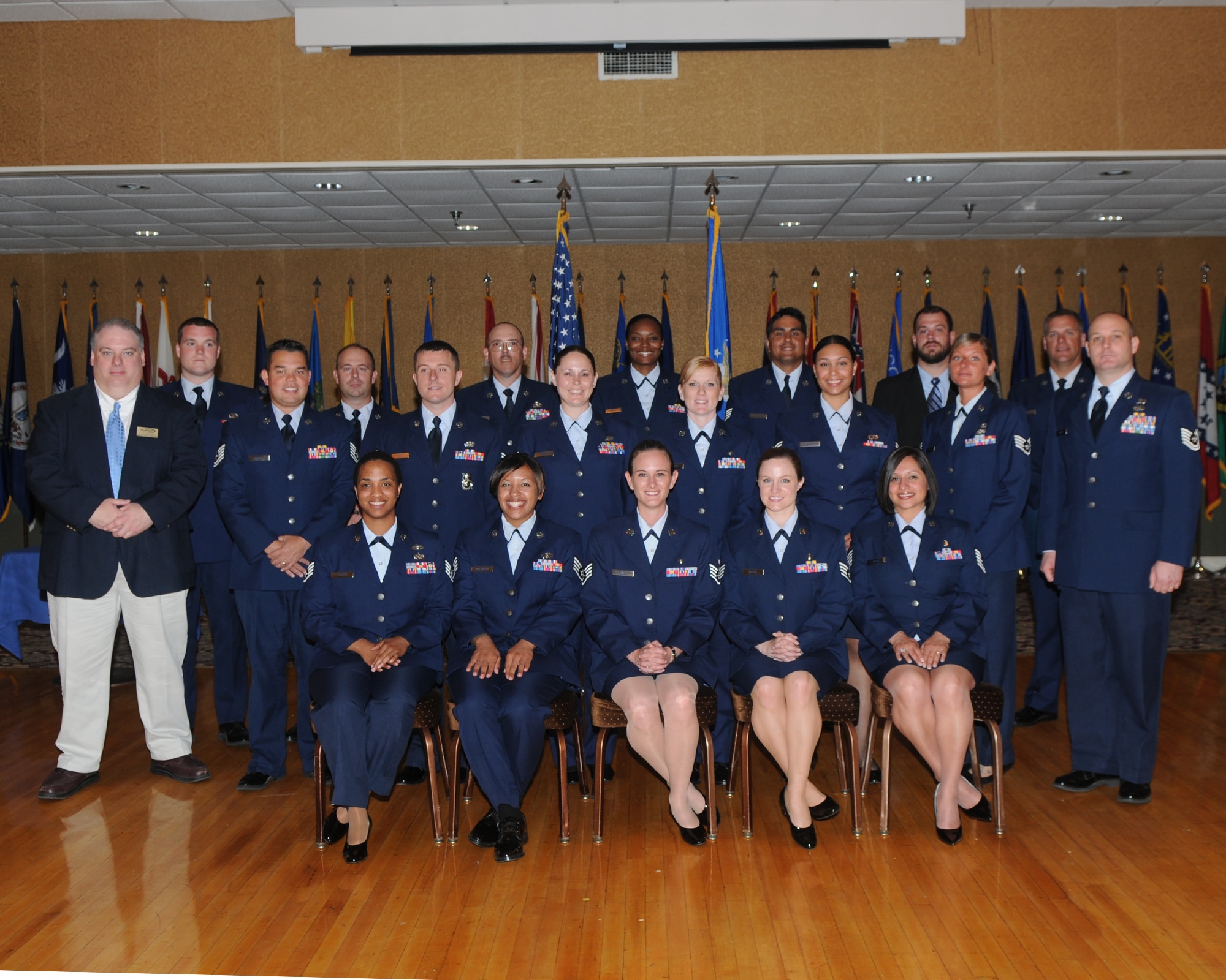 Fifty-six Air Force members recently received their Community College of the Air Force degrees here May 17 at the Columbus Club. The CCAF is a federally-chartered degree-granting institution that serves the United States Air Force’s enlisted total force. (U.S. Air Force photo/Melissa Duncan). 