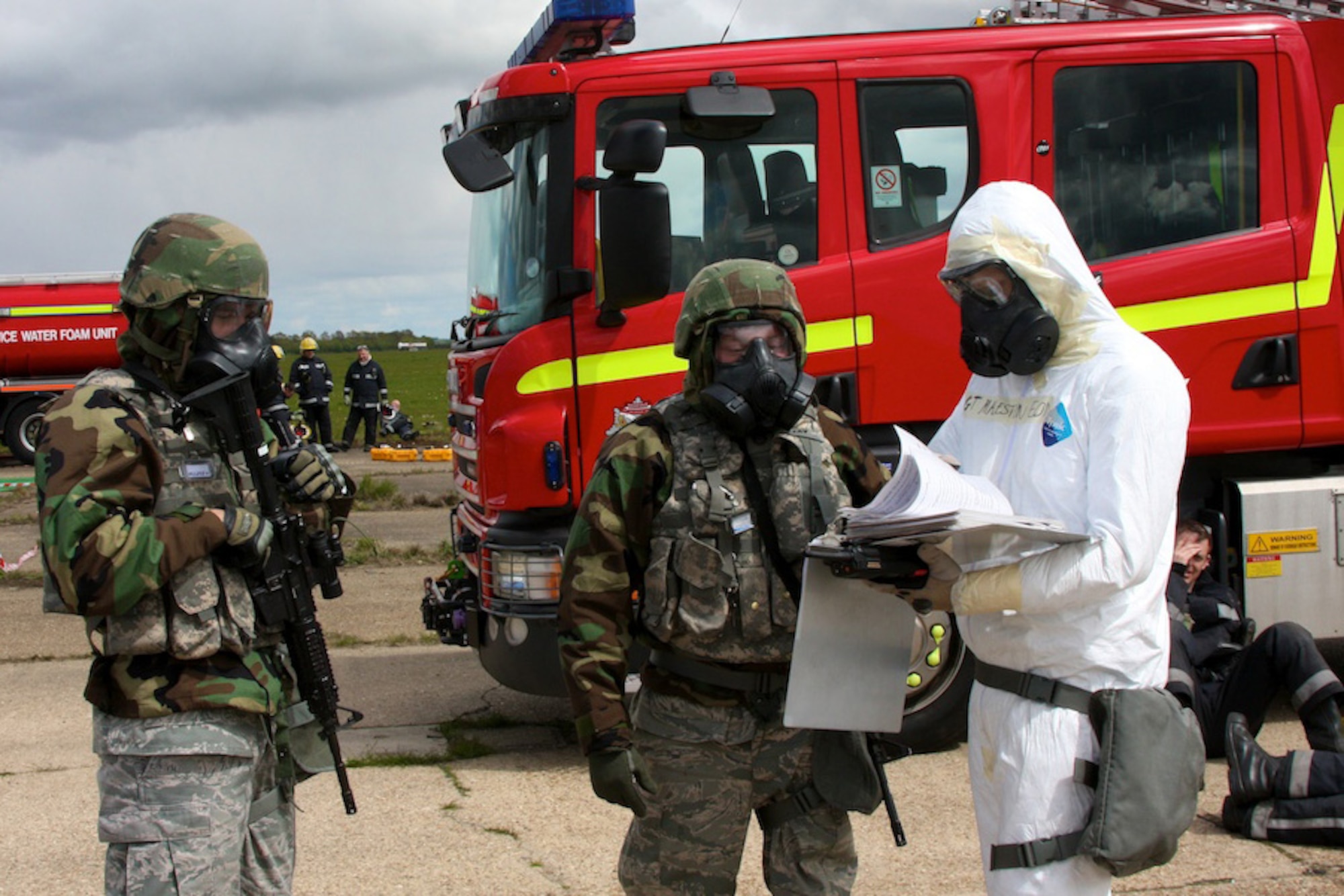 Personnel from RAF Lakenheath and 3rd Air Force participate in an emergency response exercise with British emergency services May 12, 2010 at Sculthorpe Airfield, England. The exercise, titled Astral Bend, lasted two days. The first day the emergency services team was at the airfield responding to an emergency scenario, while they spent the second day at RAF Mildenhall to conduct a table top exercise aimed at exercising the role, inter-operability and co-operation of the lead U.K. and U.S. stakeholders in the event of a major accident in the United Kingdom. (U.S. Air Force photo by Staff Sgt. Casey Pascoe)