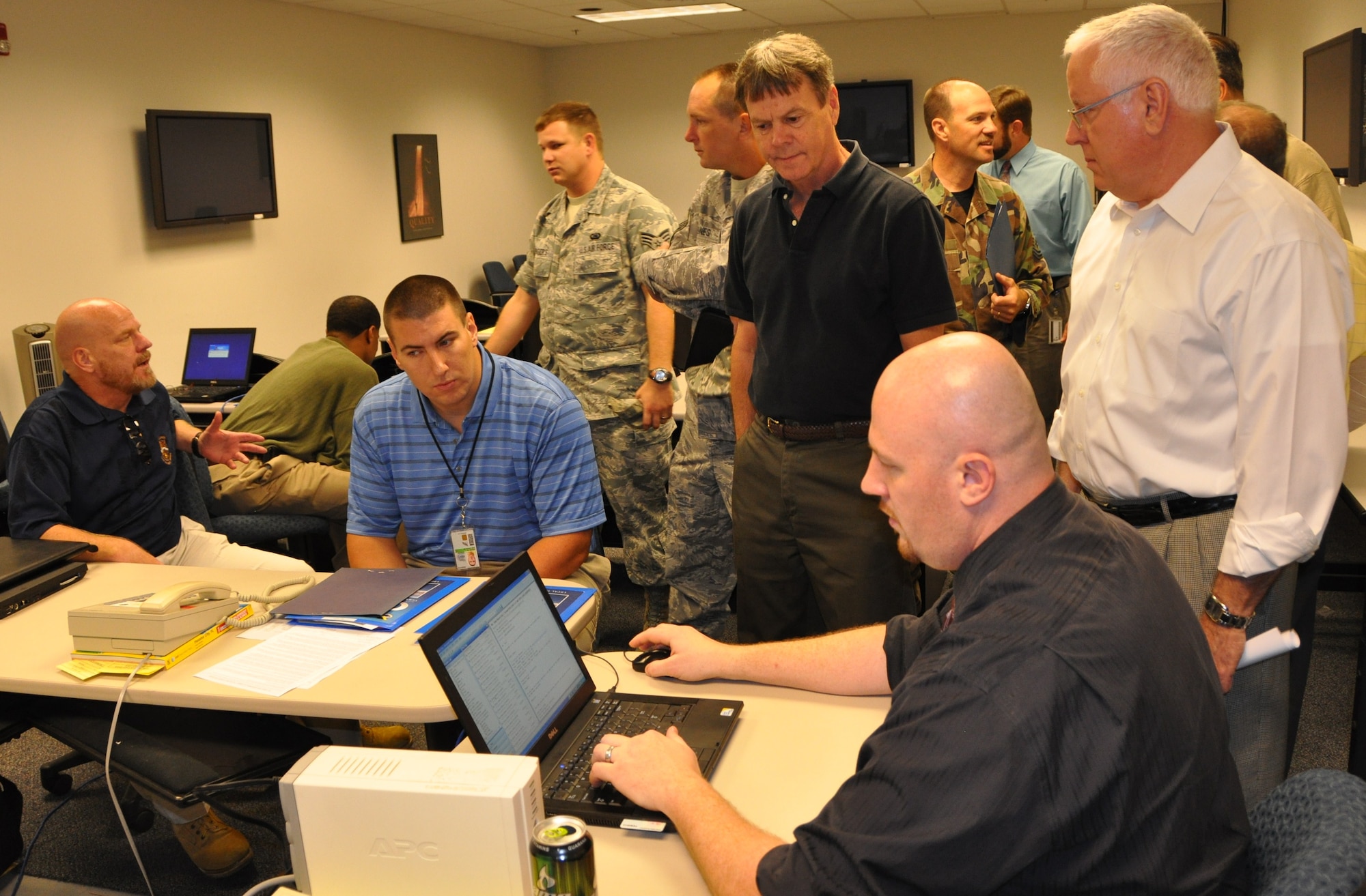 The Command Cyber Readiness Inspection team sets up shop in building 817.  The CCRI team is responsible for ensuring quality communications infrastructure and systems are in place by conducting proactive performance evaluations and assistance visits.  (U.S. Air Force photo by Senior Airman Anthony J. Hyatt)