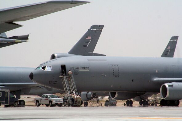 KC-10 Extender aircraft from the 908th Expeditionary Air Refueling Squadron are parked on the flightline for the 380th Air Expeditionary Wing at a non-disclosed base in Southwest Asia on May 19, 2010. According to the 380th AEW history office, In the first three months of 2010, Airmen supporting the KC-10 deployed air refueling mission in the U.S. Central Command area of responsibility helped the KC-10 fly more than 1,000 sorties offl-loading more than 108 million pounds of fuel to more than 6,600 aircraft in support of combat operations. KC-10s and the Airmen who support them are deployed from the 305th Air Mobility Wing at Joint Base McGuire-Dix-Lakehurst, N.J., and the 60th Air Mobility Wing at Travis Air Force Base, Calif. (U.S. Air Force Photo/Master Sgt. Scott T. Sturkol/Released)