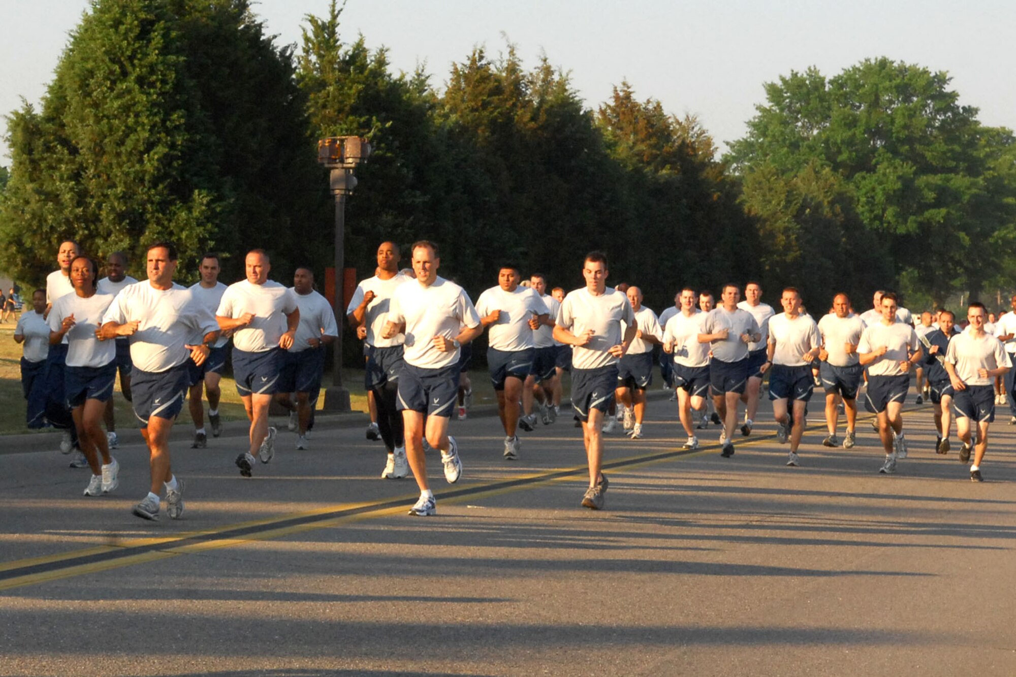 - Members of the 43rd Airlift Wing, led by Col. James Johnson, 43rd AW Commander, run along the Pope flightline during the monthly Wing Run on May 7. (U.S. Air Force Photo/Buck Buchanan)