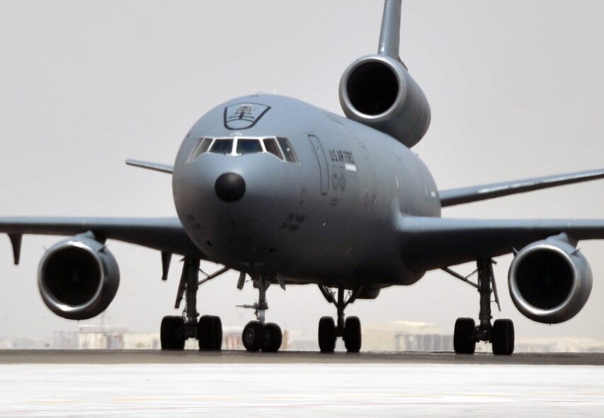 An aircrew from the 908th Expeditionary Air Refueling Squadron steers a KC-10 Extender down the taxiway of the flightline for the 380th Air Expeditionary Wing at a non-disclosed base in Southwest Asia on May 19, 2010. According to the 380th AEW history office, In the first three months of 2010, Airmen supporting the KC-10 deployed air refueling mission in the U.S. Central Command area of responsibility helped the KC-10 fly more than 1,000 sorties offl-loading more than 108 million pounds of fuel to more than 6,600 aircraft in support of combat operations. KC-10s and the Airmen who support them are deployed from the 305th Air Mobility Wing at Joint Base McGuire-Dix-Lakehurst, N.J., and the 60th Air Mobility Wing at Travis Air Force Base, Calif. (U.S. Air Force Photo/Master Sgt. Scott T. Sturkol)